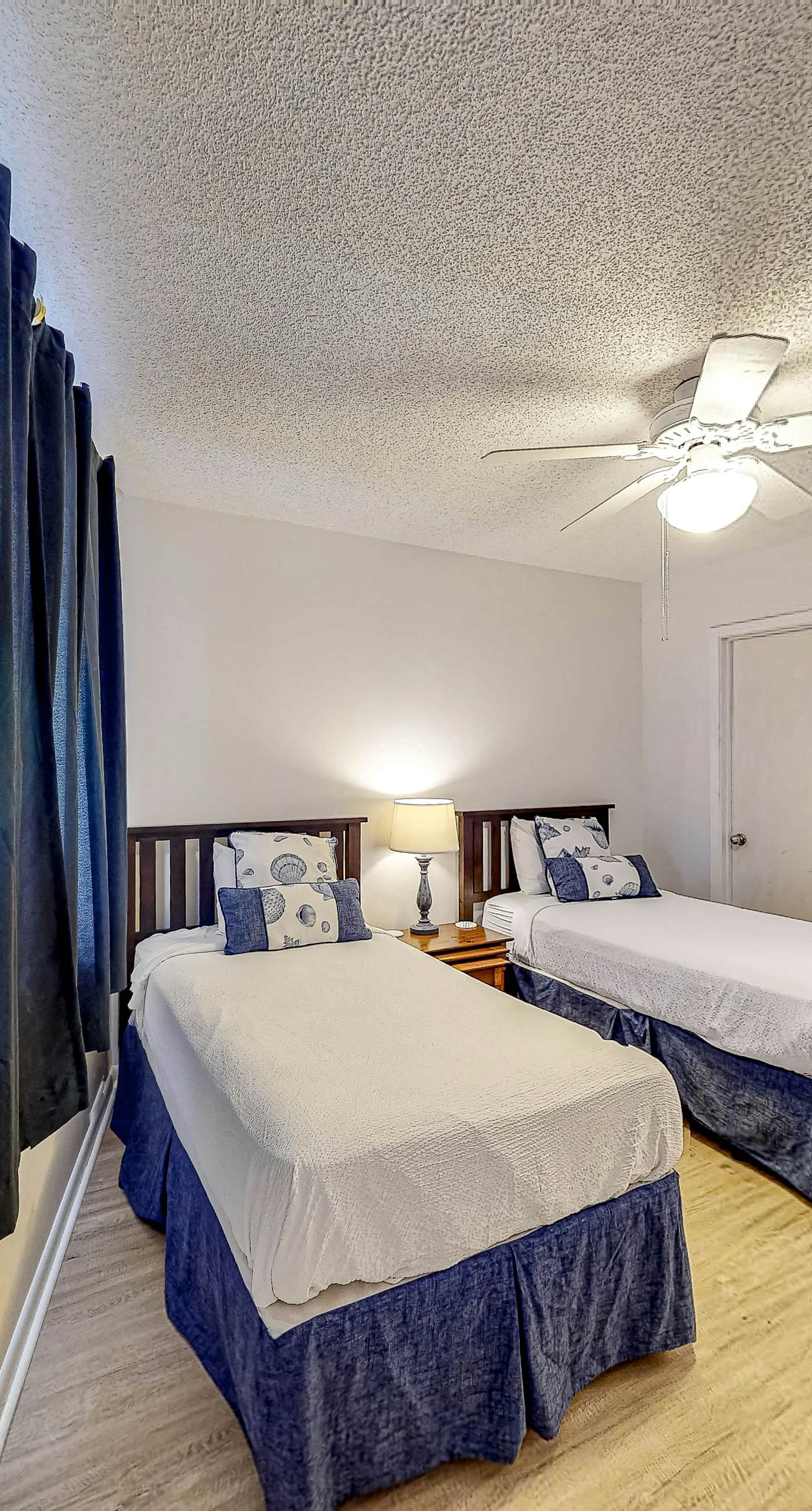 Gulf-view condo with balcony, pools, hot tub, beach access, & sports courts