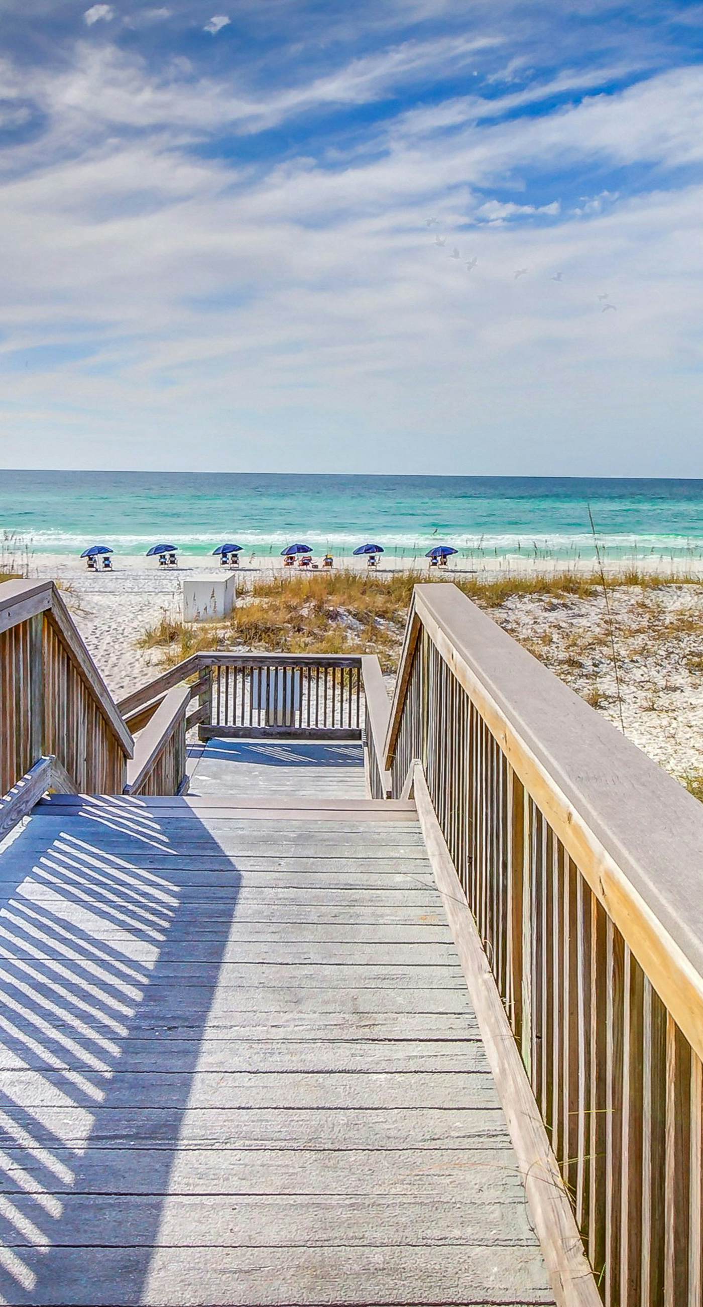 Gulf-view condo with balcony, pools, hot tub, beach access, & sports courts