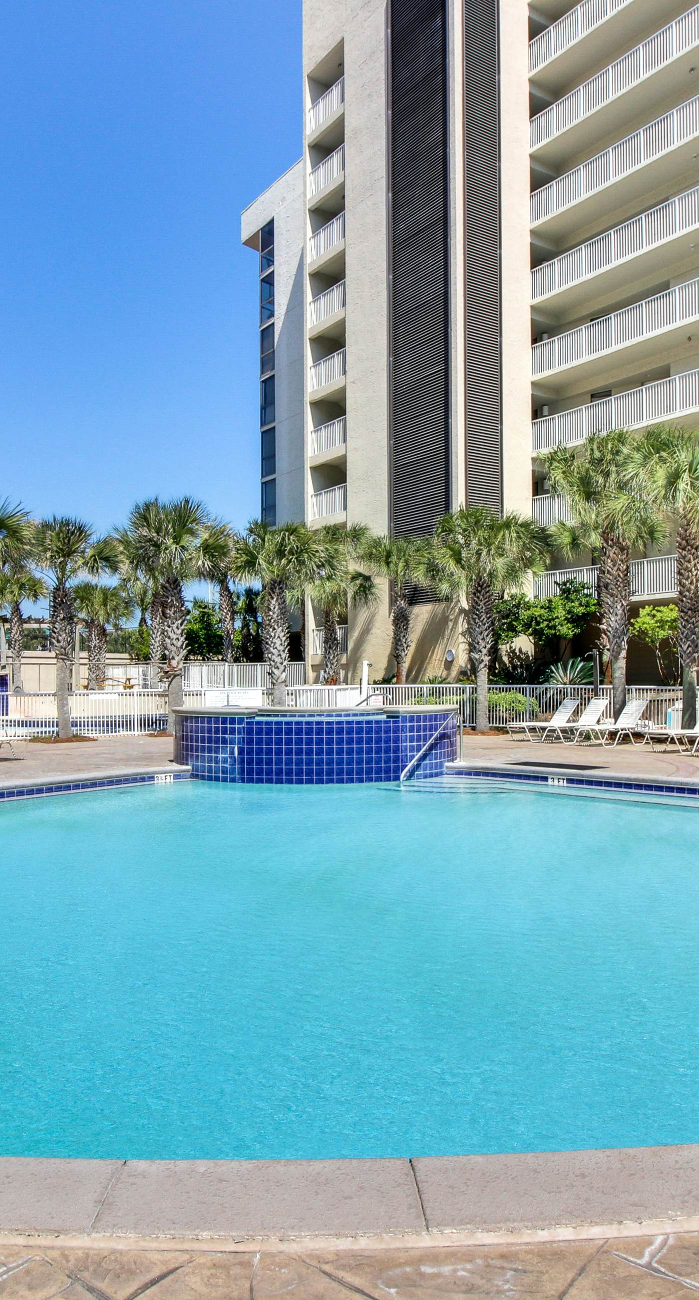 Gulf-view condo with balcony, pools, hot tub, beach access, & sports courts