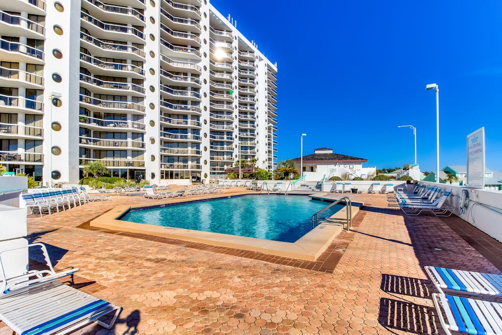 Condo in waterfront resort with balcony, AC & 2 pools - walk to beach