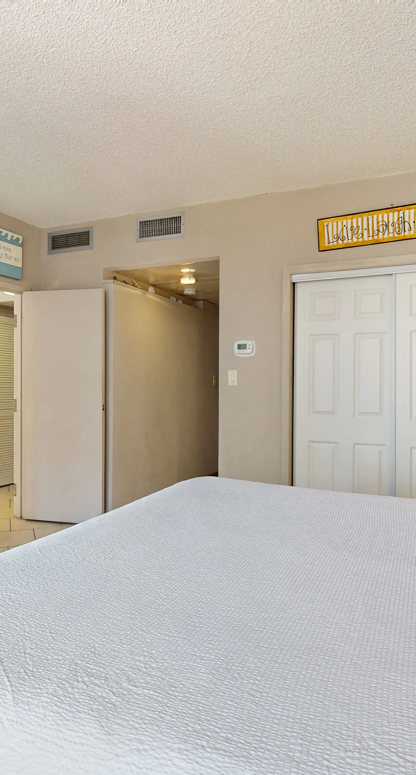 Condo in waterfront resort with balcony, AC & 2 pools - walk to beach