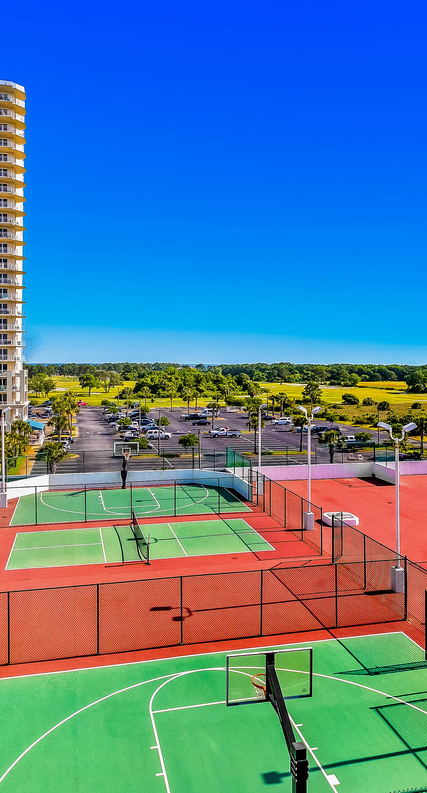 Condo in waterfront resort with balcony, AC & 2 pools - walk to beach