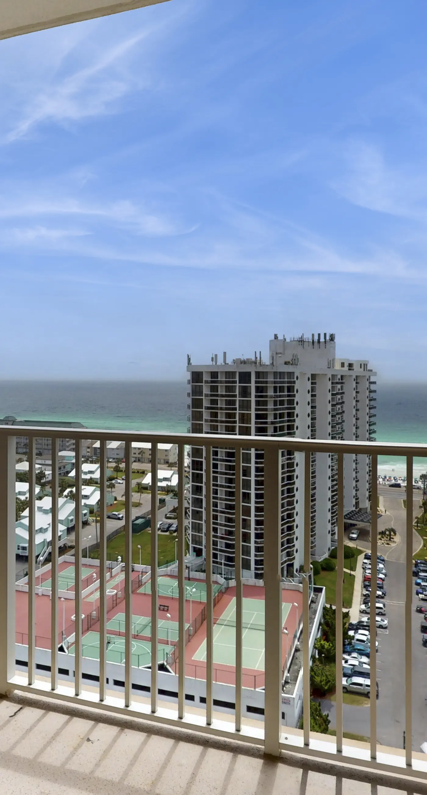Charming 16th-floor condo w/furnished balcony, beach & Gulf views, shared pool