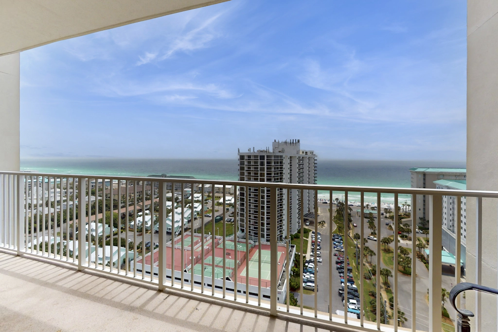 Charming 16th-floor condo with furnished balcony, beach & Gulf views, shared pool