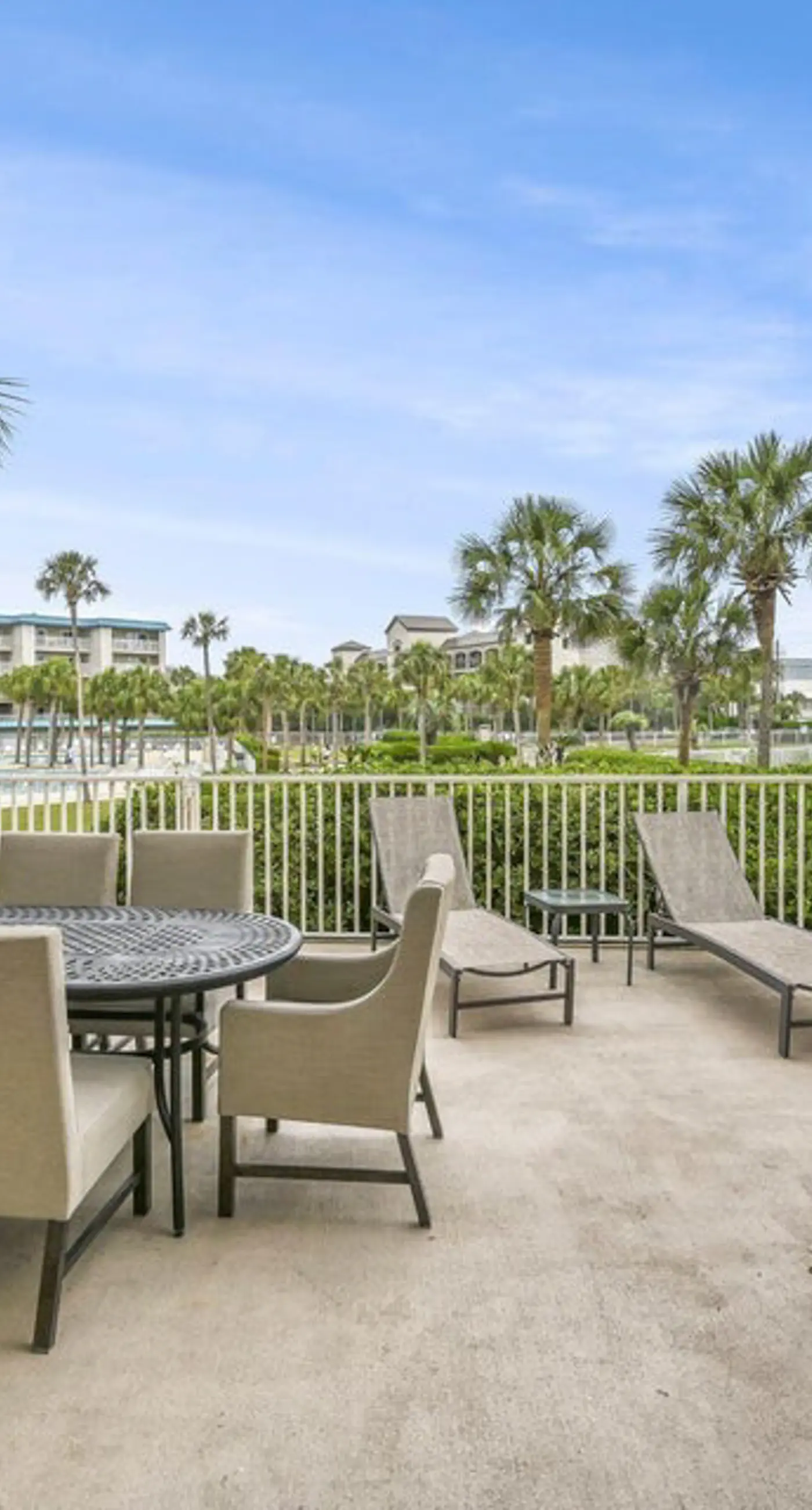 Ground-floor condo with large patio, pools, tennis, & parking - steps to beach