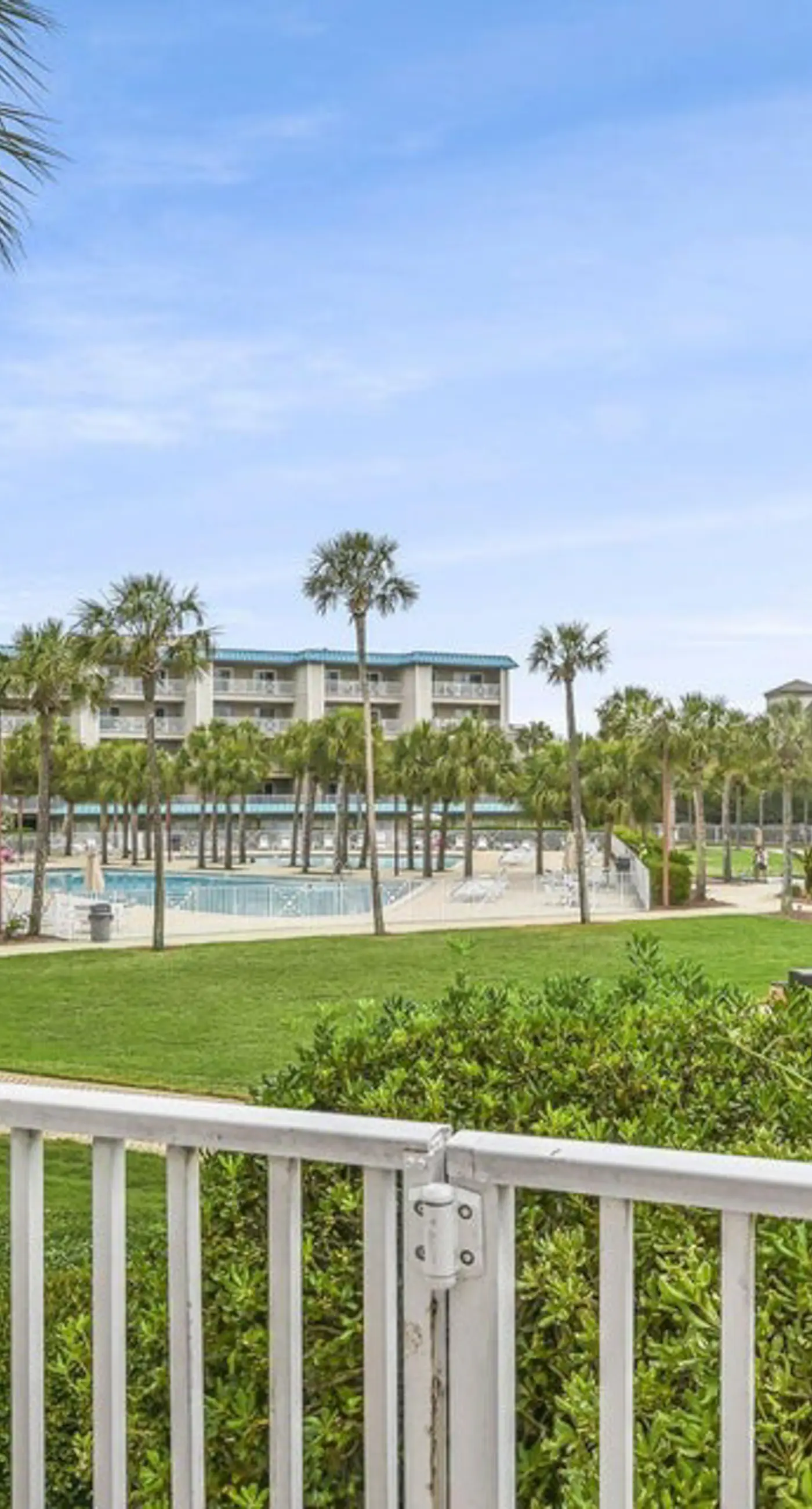 Ground-floor condo with large patio, pools, tennis, & parking - steps to beach