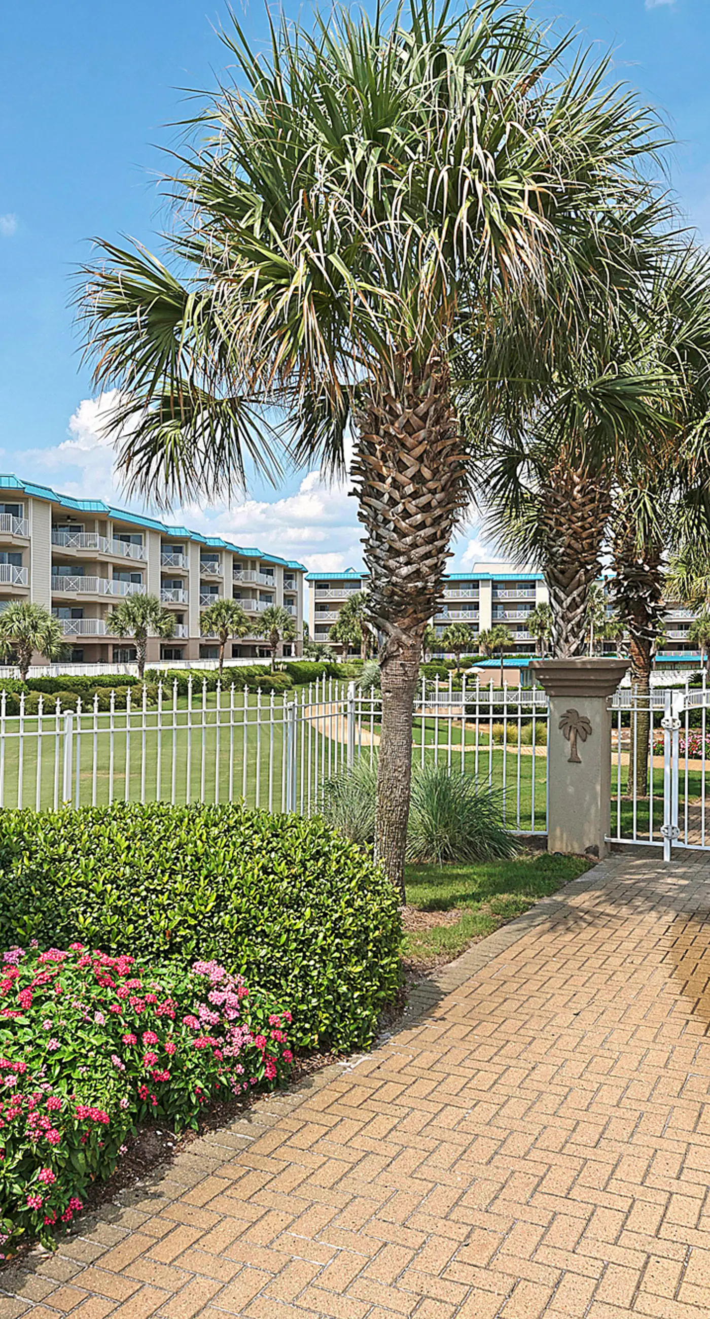 Ground-floor condo with large patio, pools, tennis, & parking - steps to beach