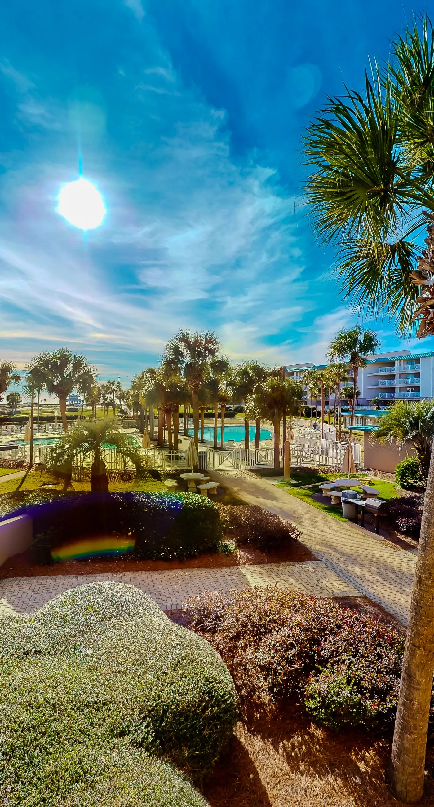 Ocean view condo with high-speed WiFi, balcony, shared pool, & beach access