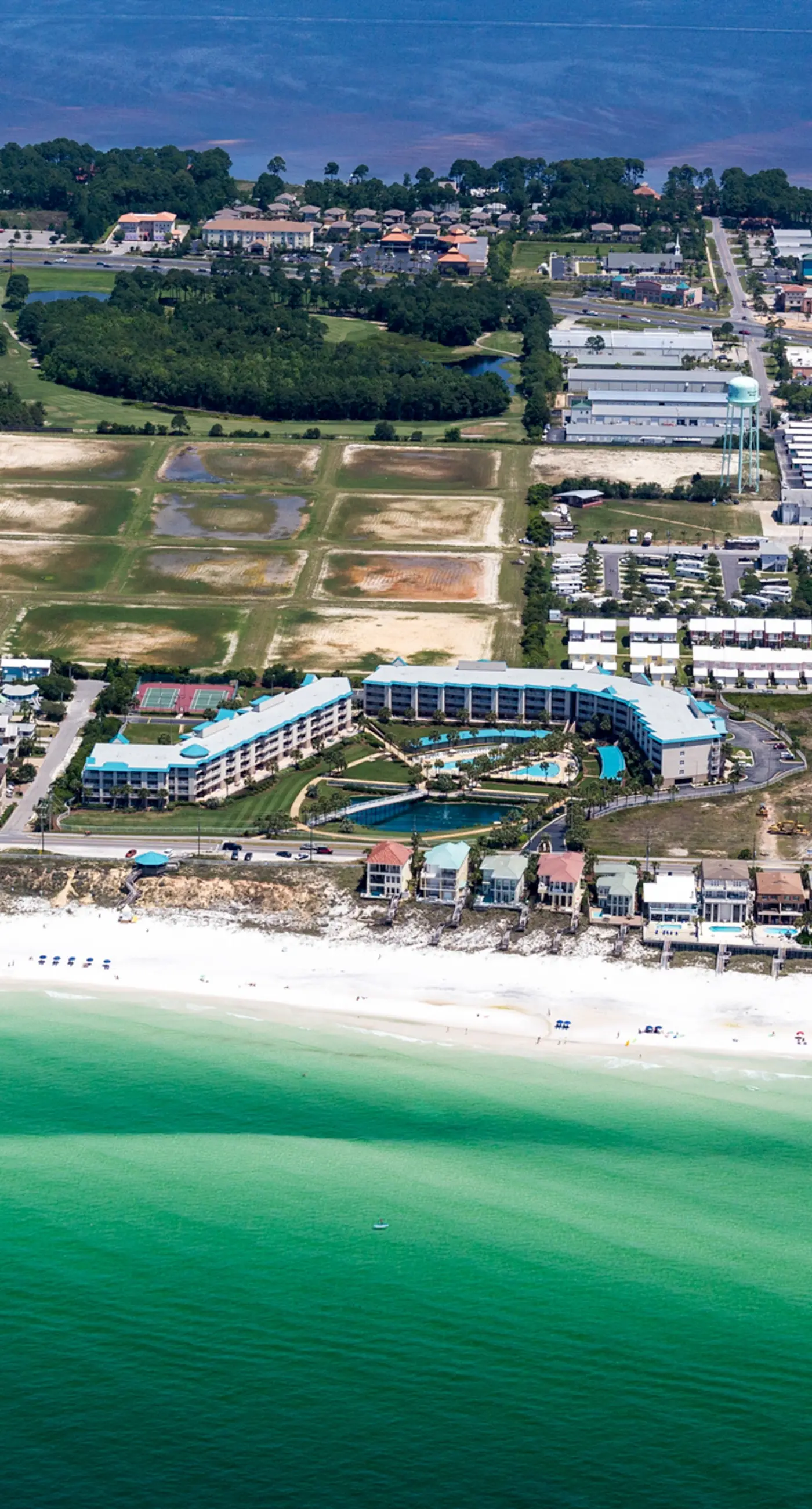 Ocean view condo with high-speed WiFi, balcony, shared pool, & beach access