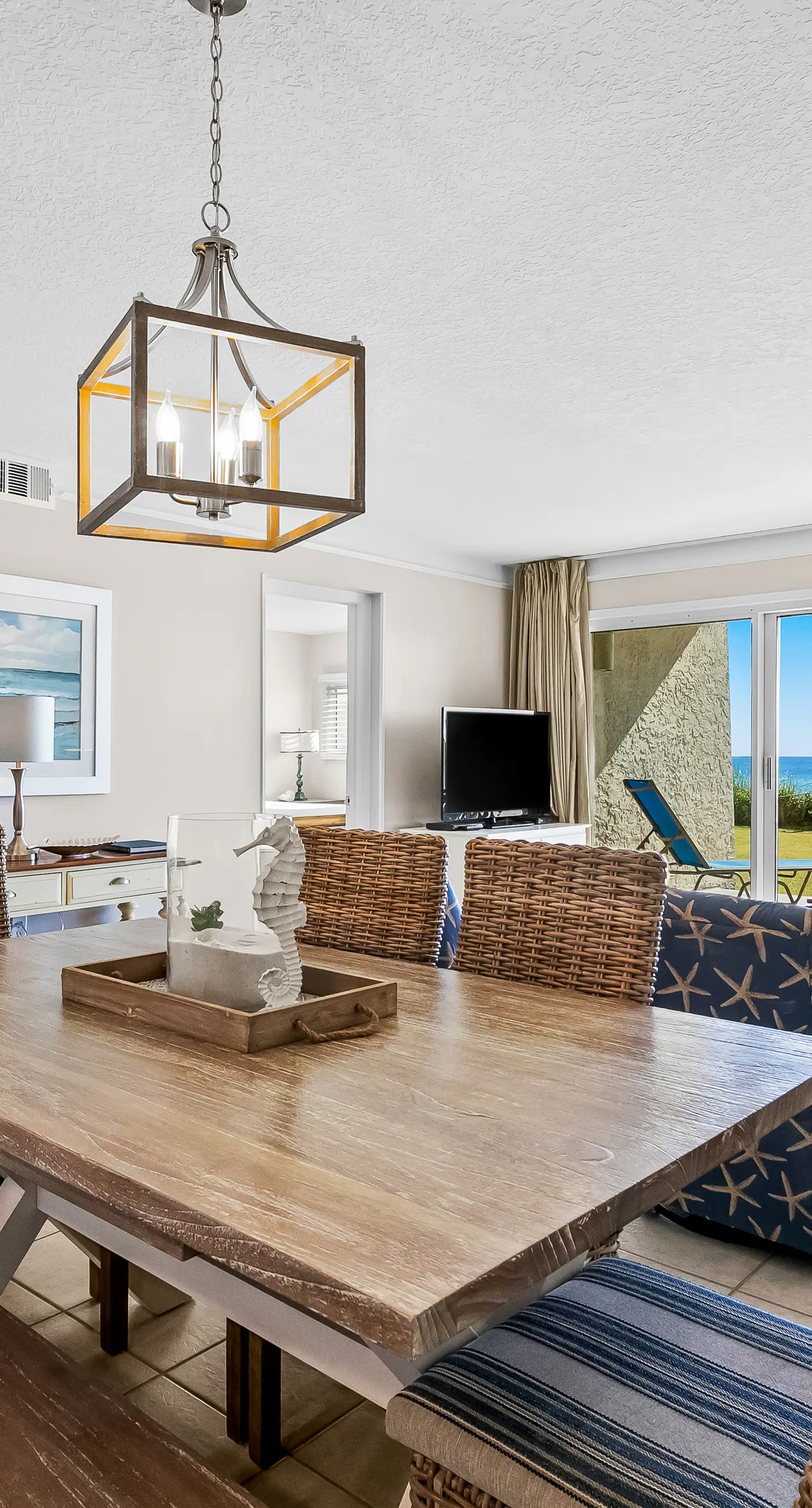 Gulf and beachfront condo with furnished patio, outdoor pool, gym & tennis