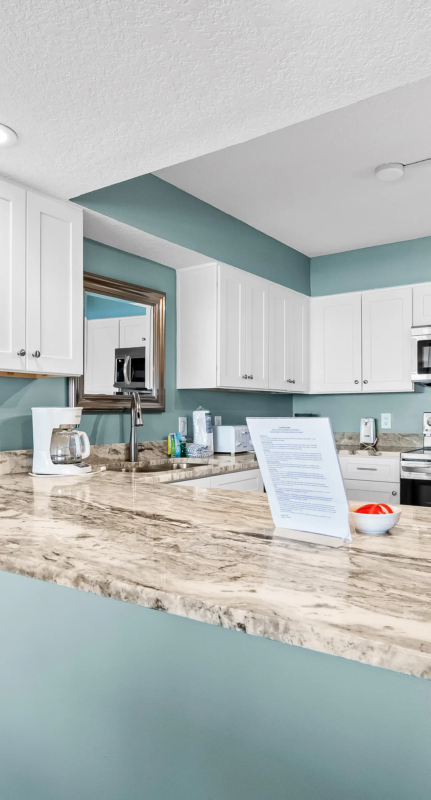 Gulf and beachfront condo with furnished patio, outdoor pool, gym & tennis