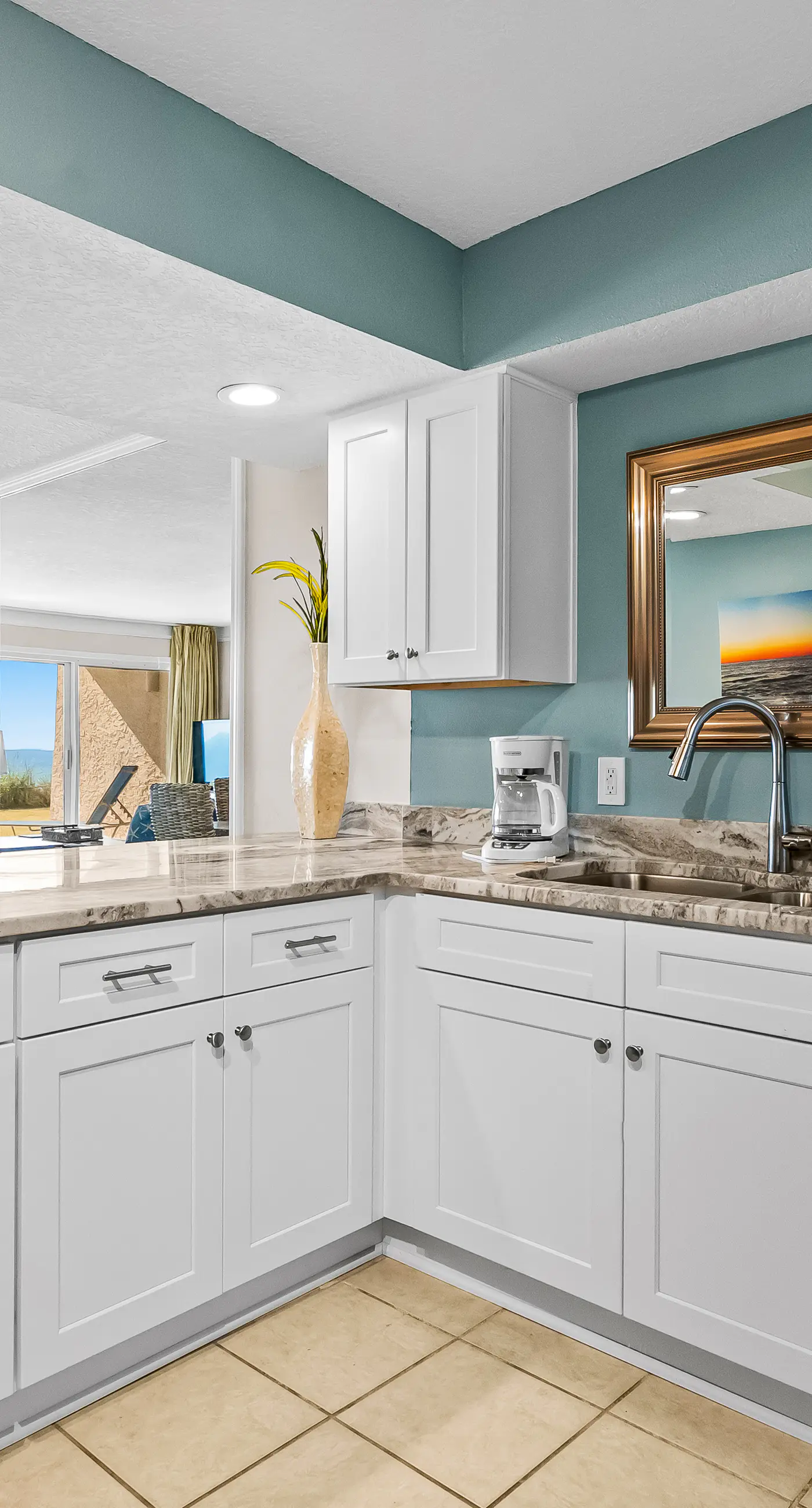 Gulf and beachfront condo with furnished patio, outdoor pool, gym & tennis