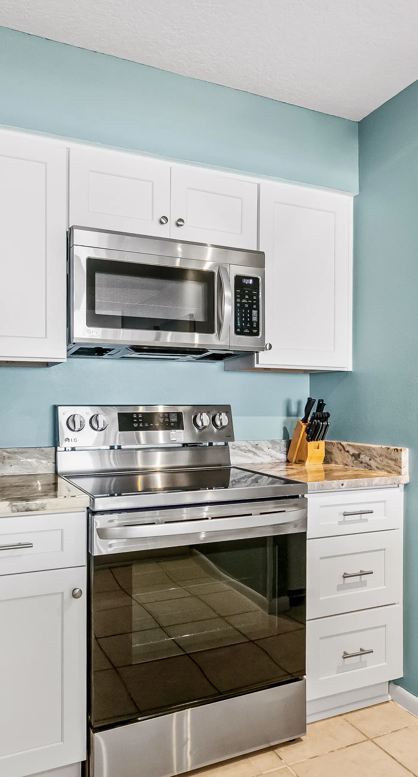 Gulf and beachfront condo with furnished patio, outdoor pool, gym & tennis