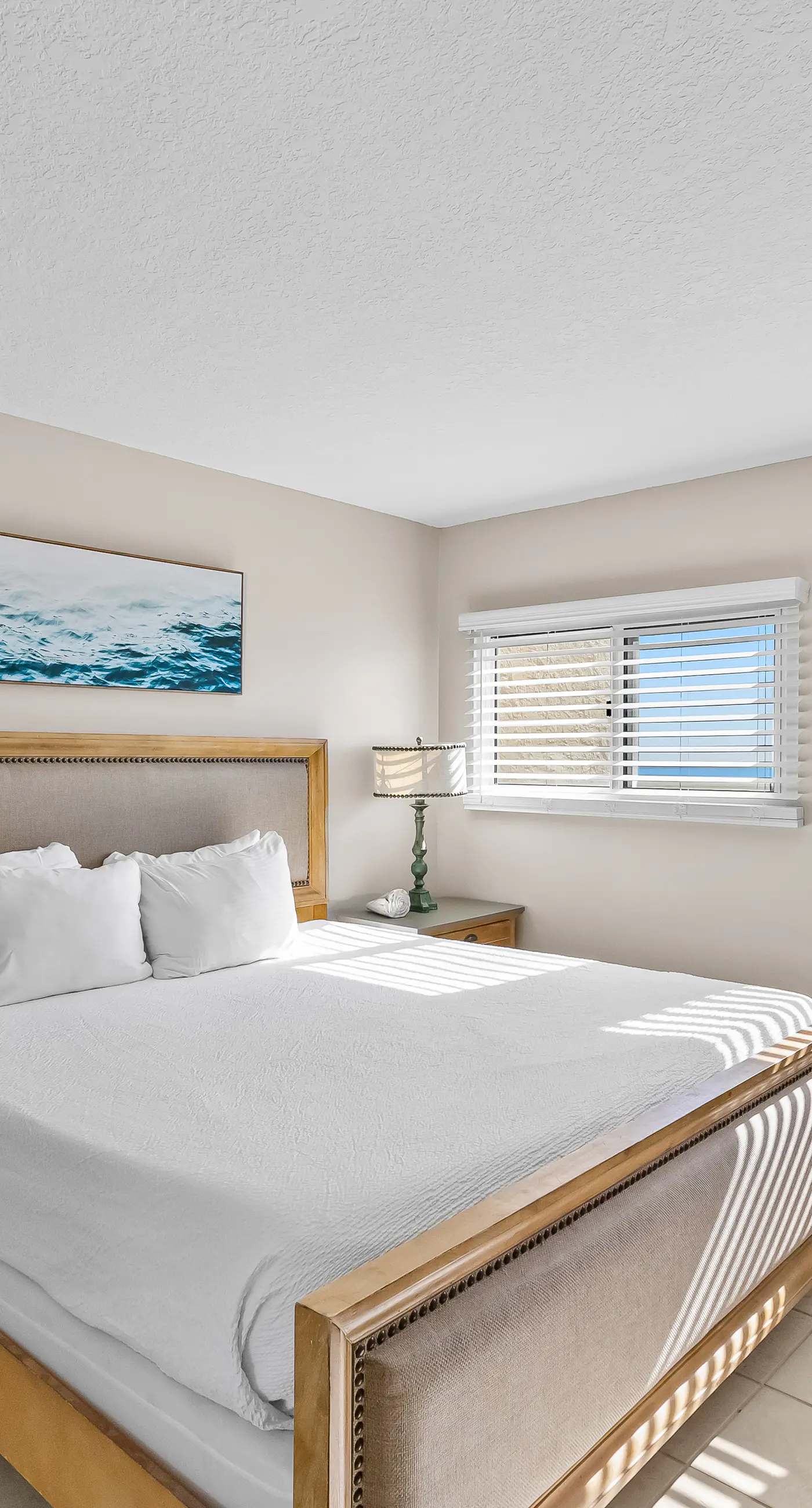 Gulf and beachfront condo with furnished patio, outdoor pool, gym & tennis