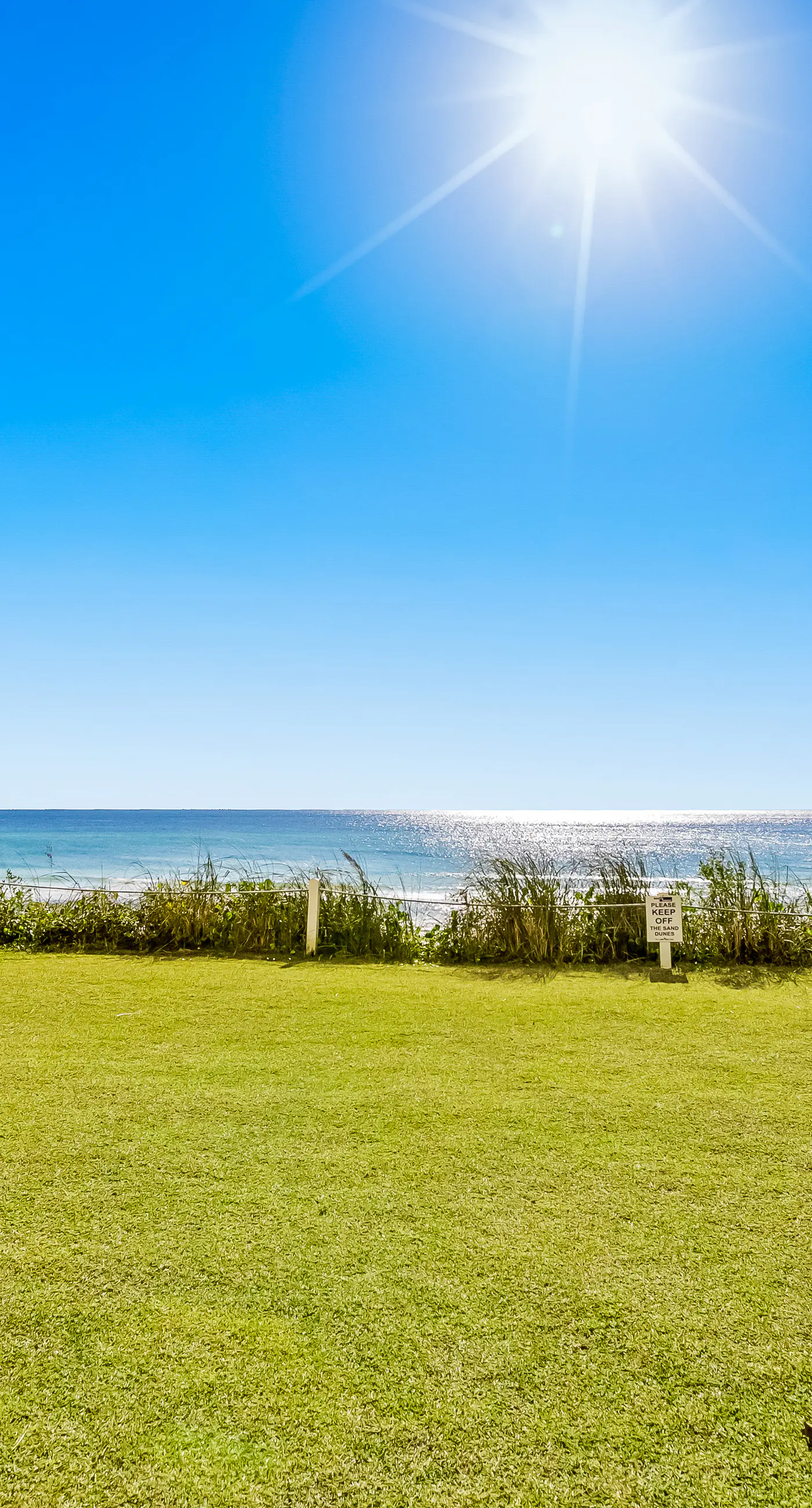 Gulf and beachfront condo with furnished patio, outdoor pool, gym & tennis