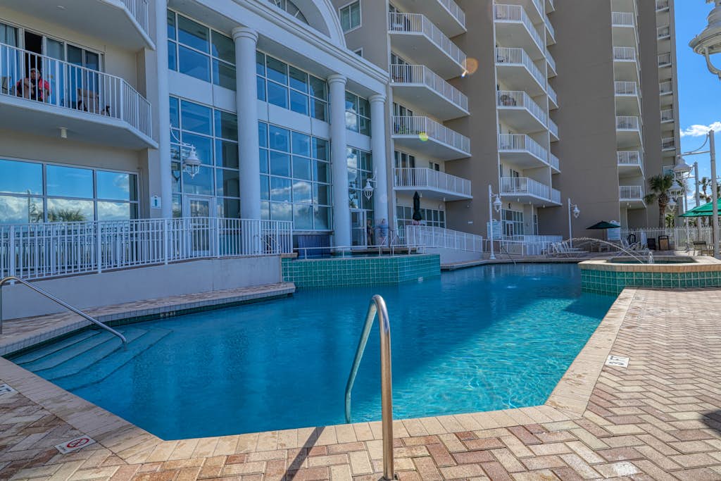 Indulge in coastal luxury at Majestic Sun A0913, a beachfront condo in Miramar Beach, Florida. Enjoy stunning ocean views, direct beach access, and resort amenities like a private pool and hot tub. Perfect for families, this two-bedroom, two-bathroom retreat features a fully equipped kitchen and a private balcony. Explore nearby golf, dining, shopping, and entertainment for an unforgettable vacation.