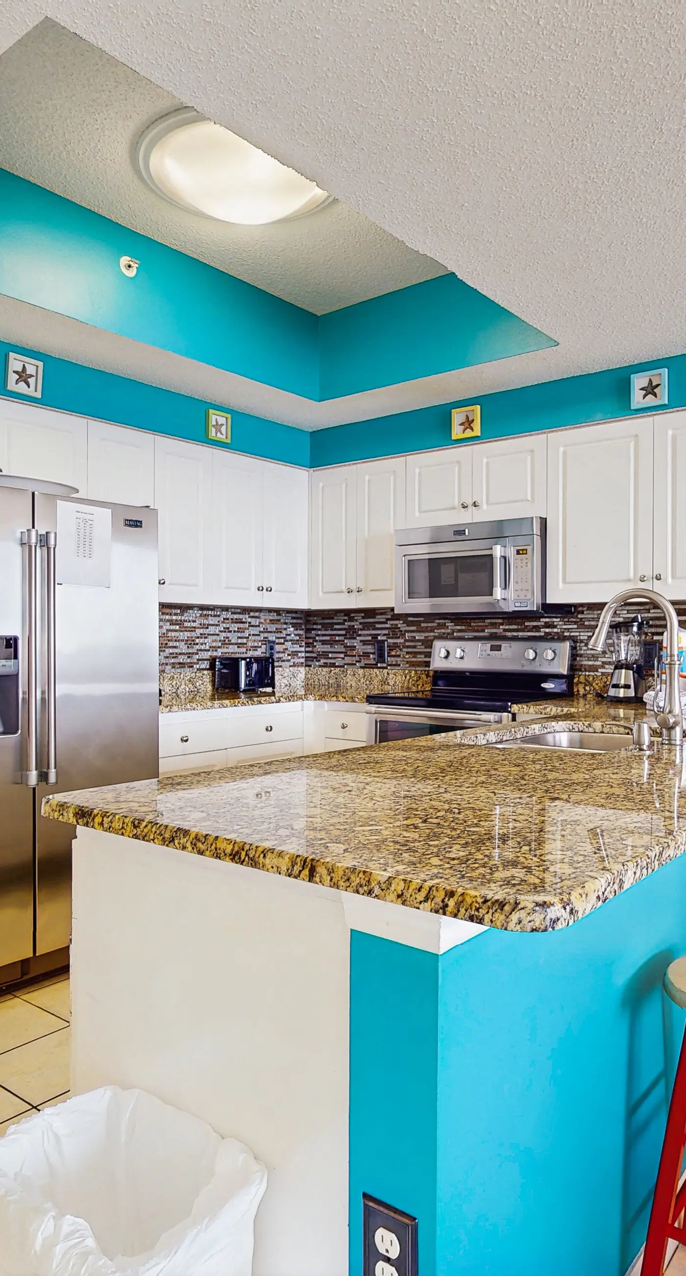 Gulf front getaway w/ a furnished balcony, shared pool, & resort amenities