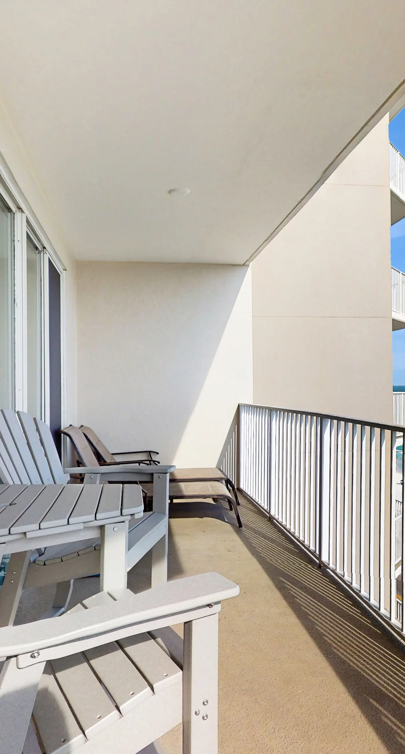 Gulf front getaway w/ a furnished balcony, shared pool, & resort amenities