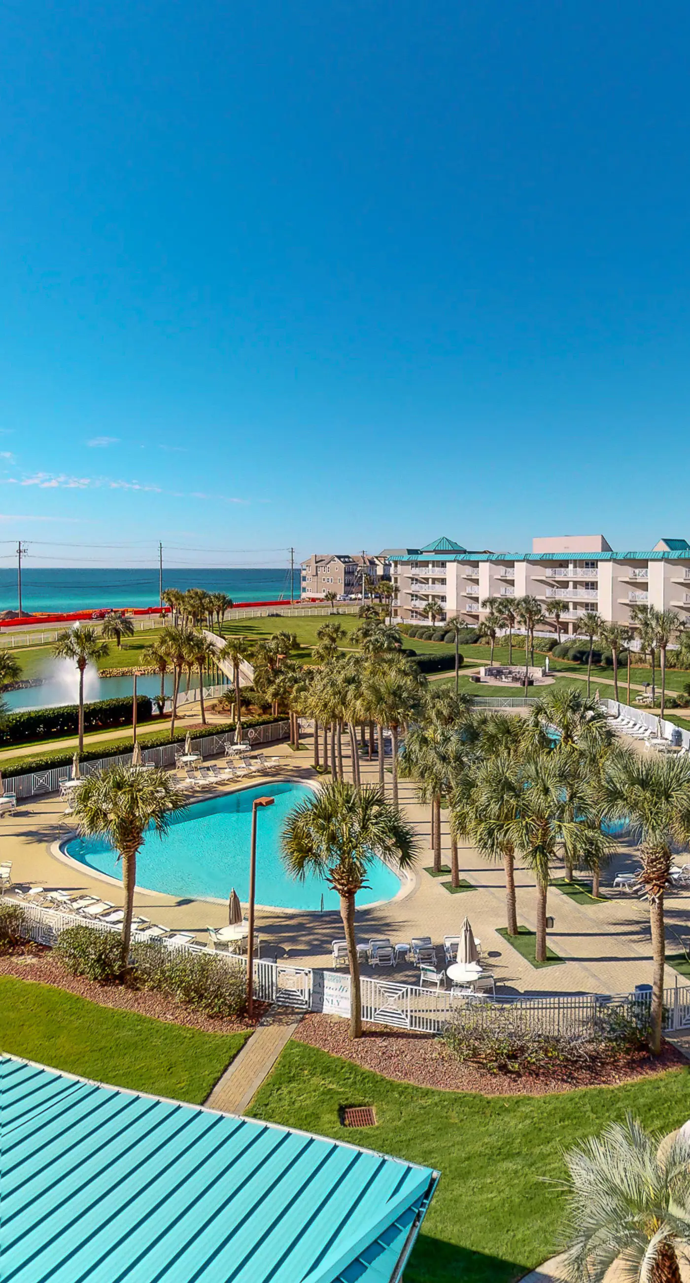 Bright & comfortable gulf-side condo overlooking beach with WiFi, pool, central AC