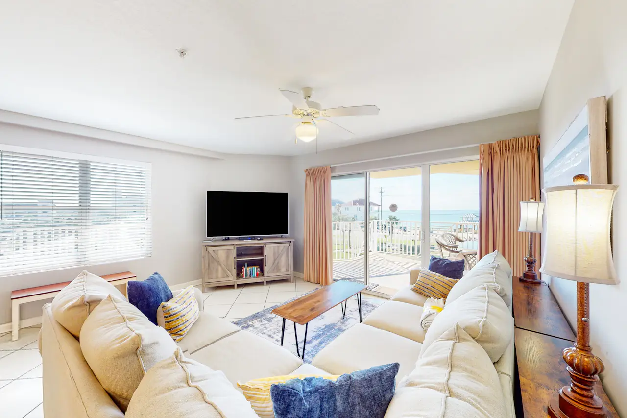 Colorful, third-floor condo w/partial gulf views, shared outdoor pool ...