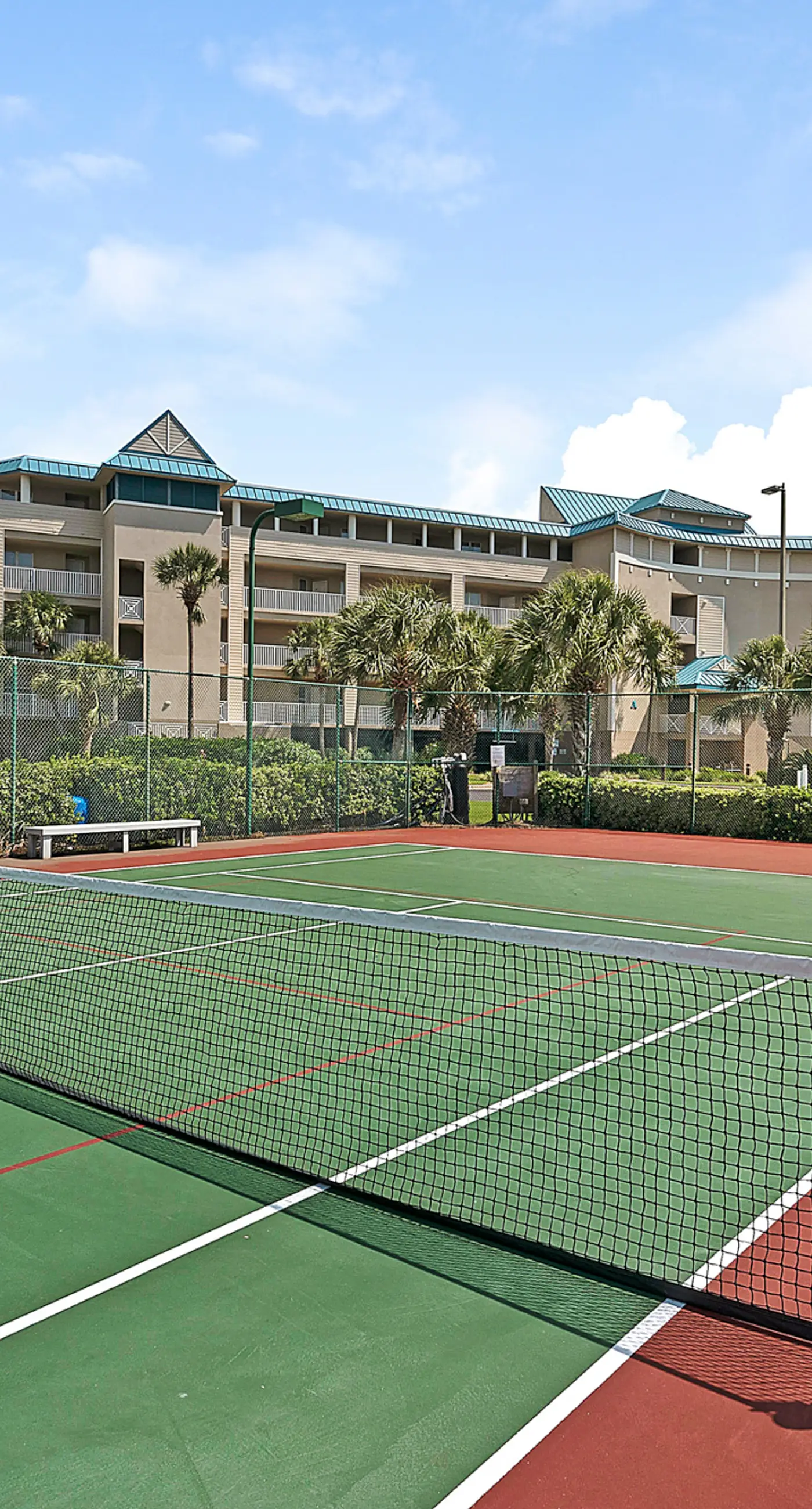 Colorful, third-floor condo w/partial gulf views, shared outdoor pool and tennis