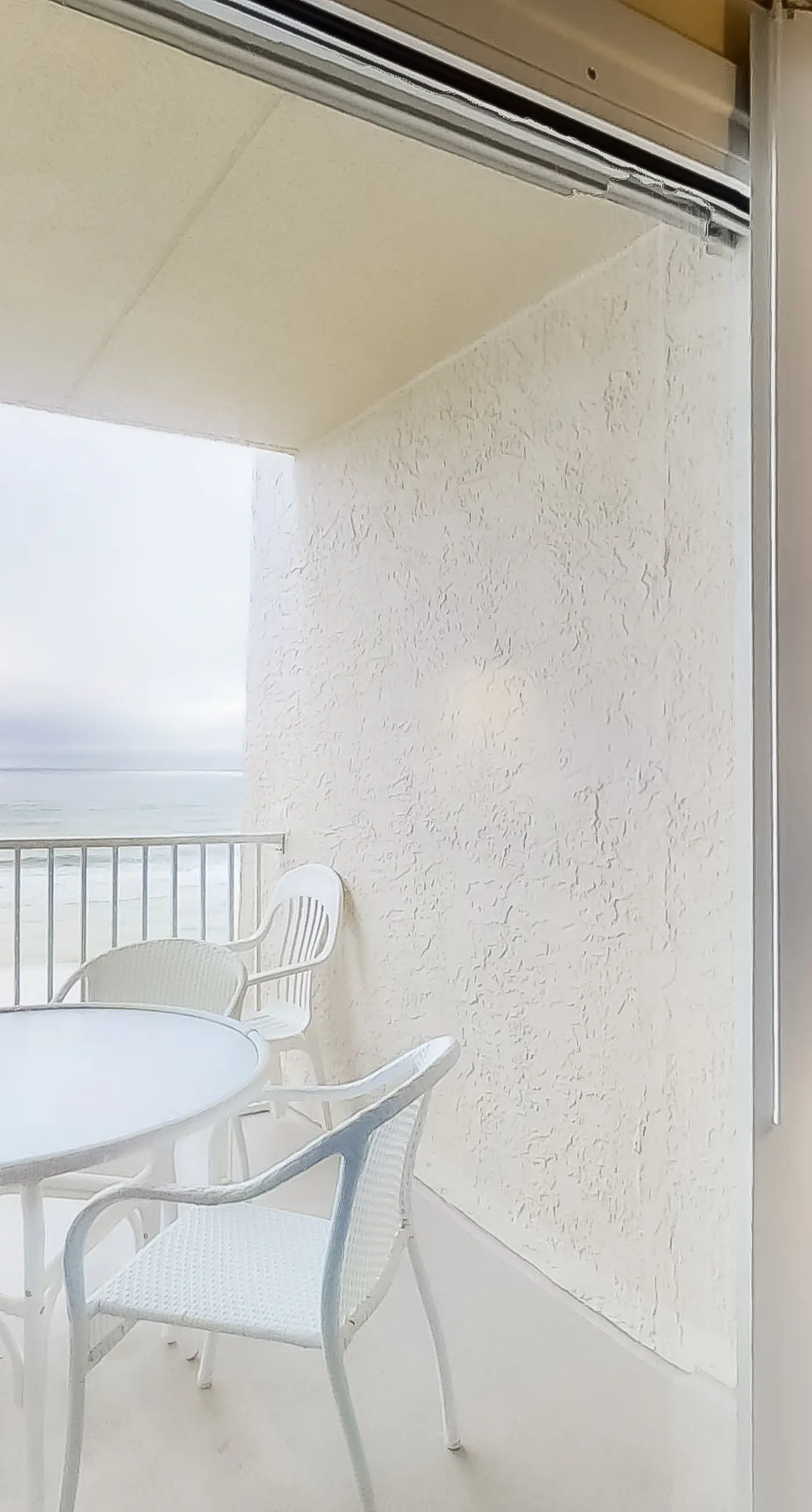 Bright oceanfront condo on 3rd floor with Gulf views, outdoor pool & gym