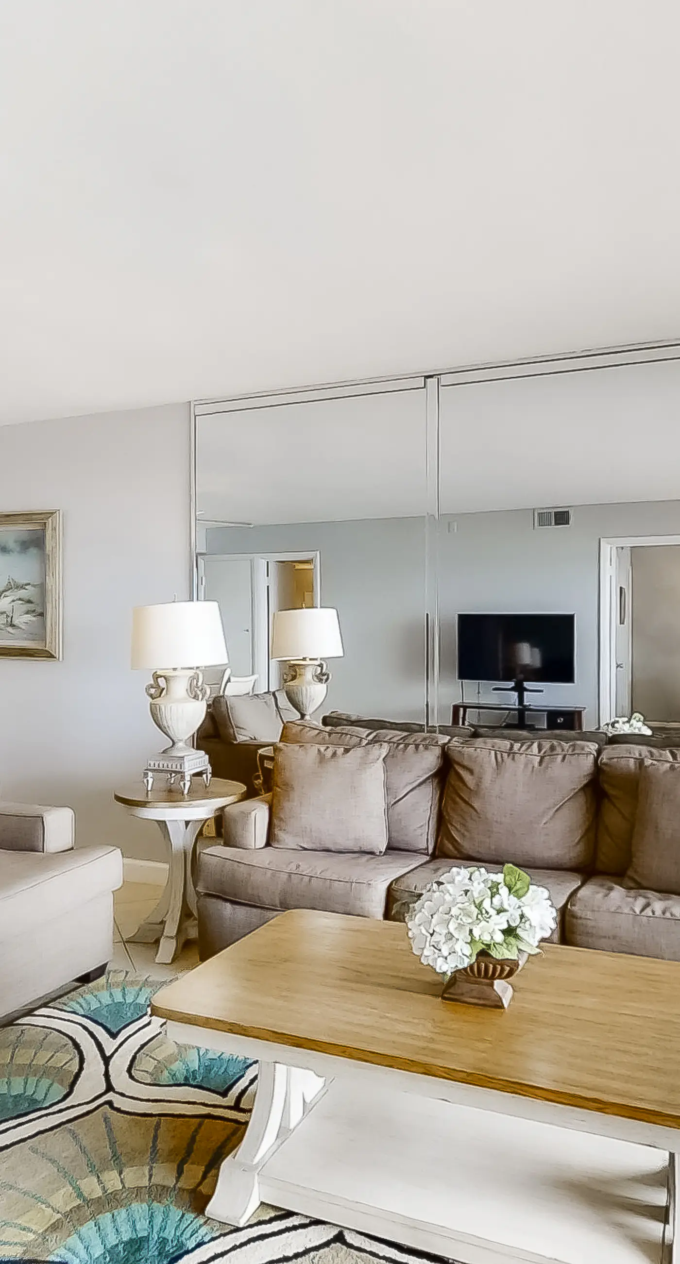 Spacious beachfront condo on second floor with balcony, beach views & pool