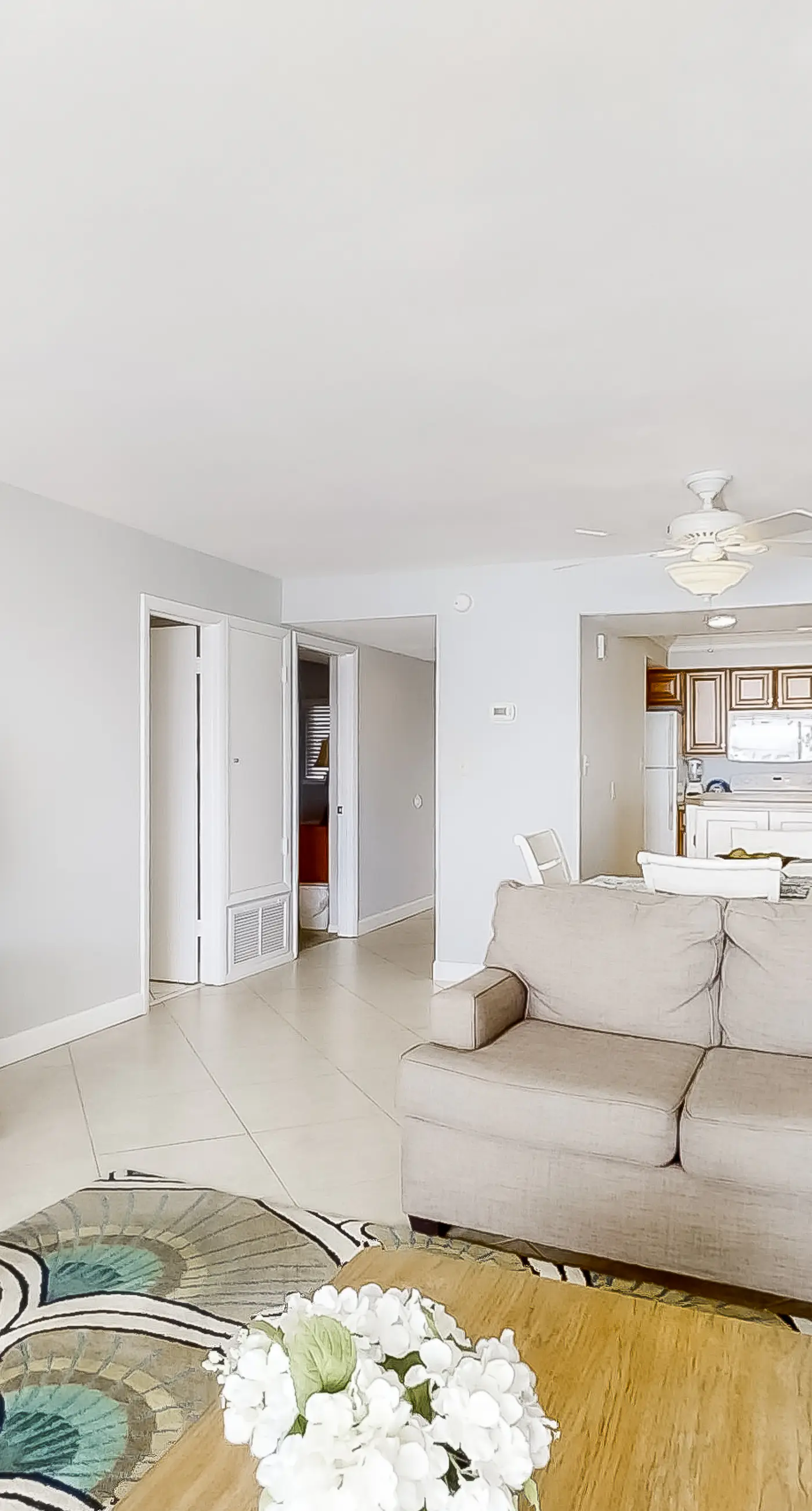 Spacious beachfront condo on second floor with balcony, beach views & pool