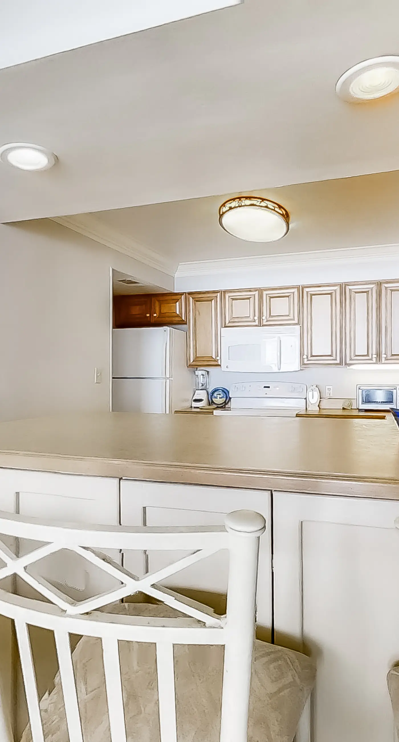 Spacious beachfront condo on second floor with balcony, beach views & pool