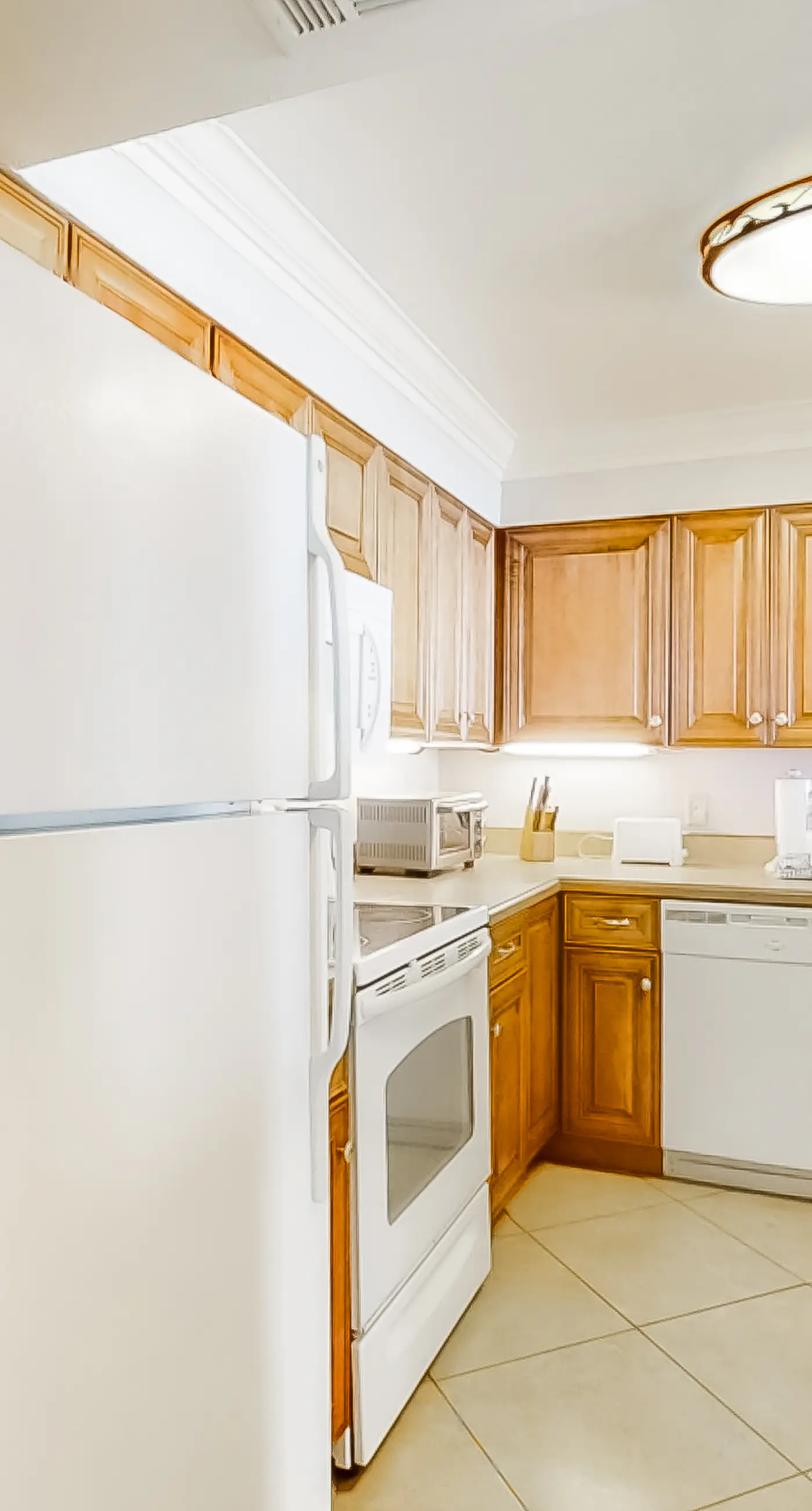 Spacious beachfront condo on second floor with balcony, beach views & pool