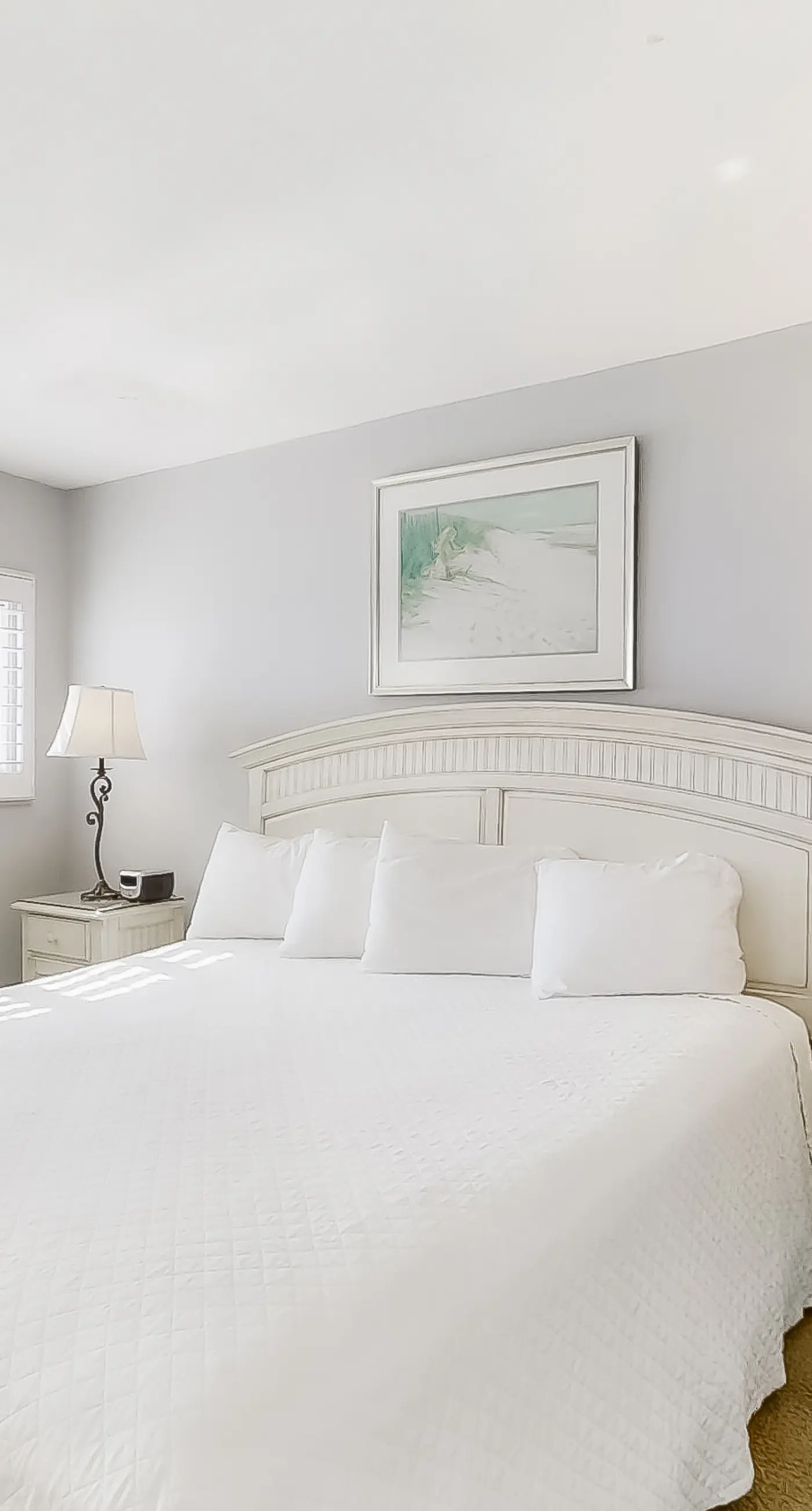 Spacious beachfront condo on second floor with balcony, beach views & pool