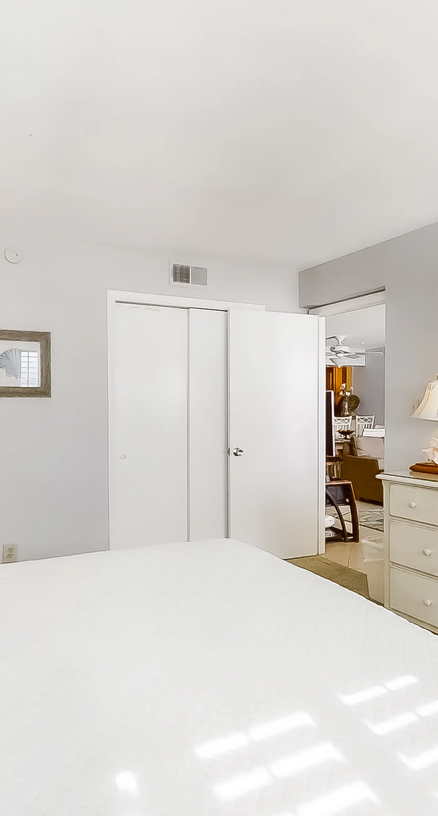 Spacious beachfront condo on second floor with balcony, beach views & pool