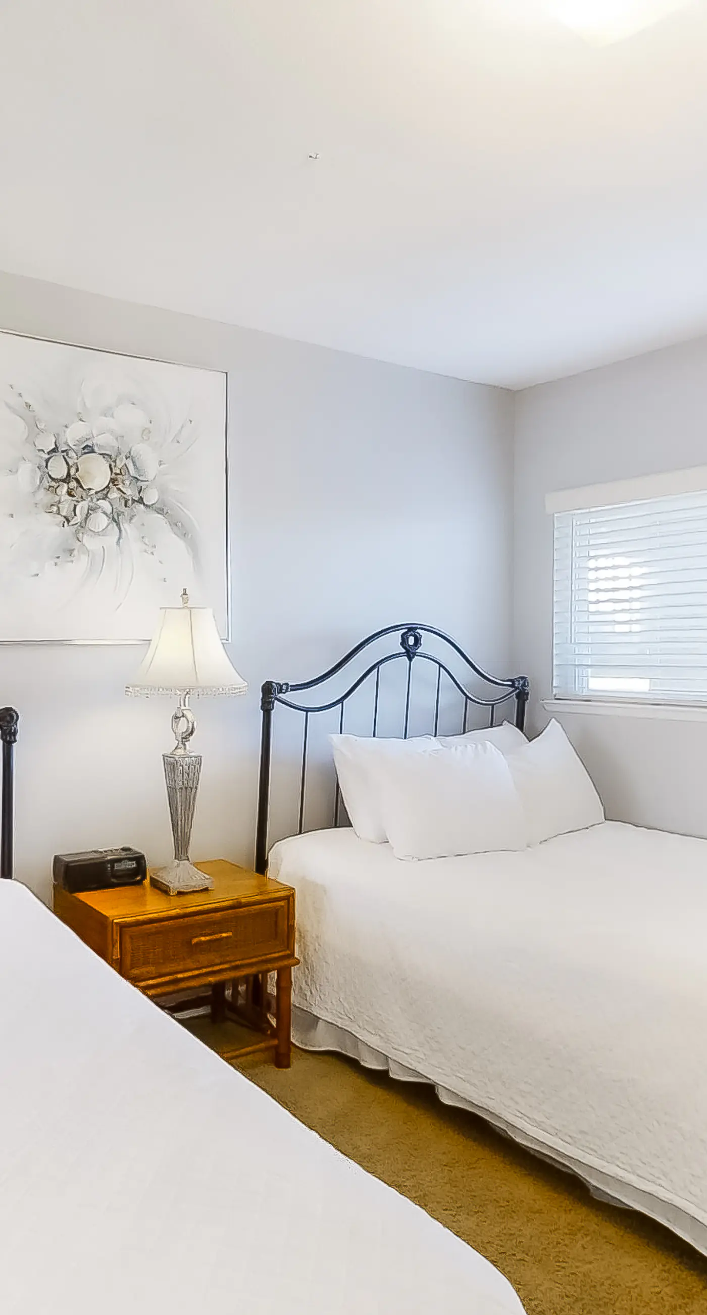 Spacious beachfront condo on second floor with balcony, beach views & pool