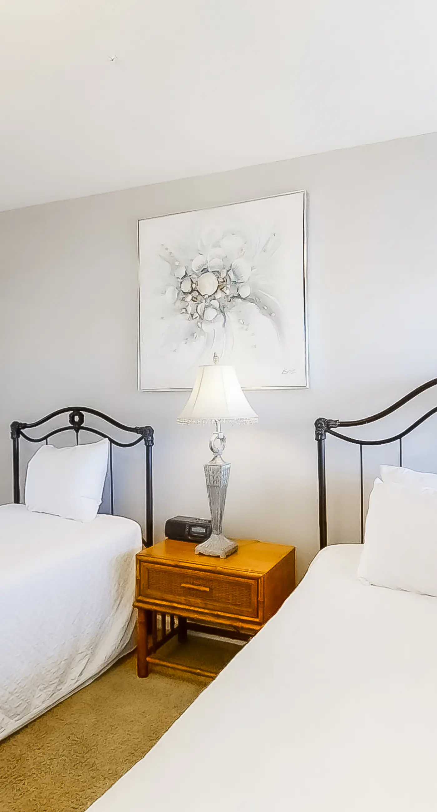 Spacious beachfront condo on second floor with balcony, beach views & pool