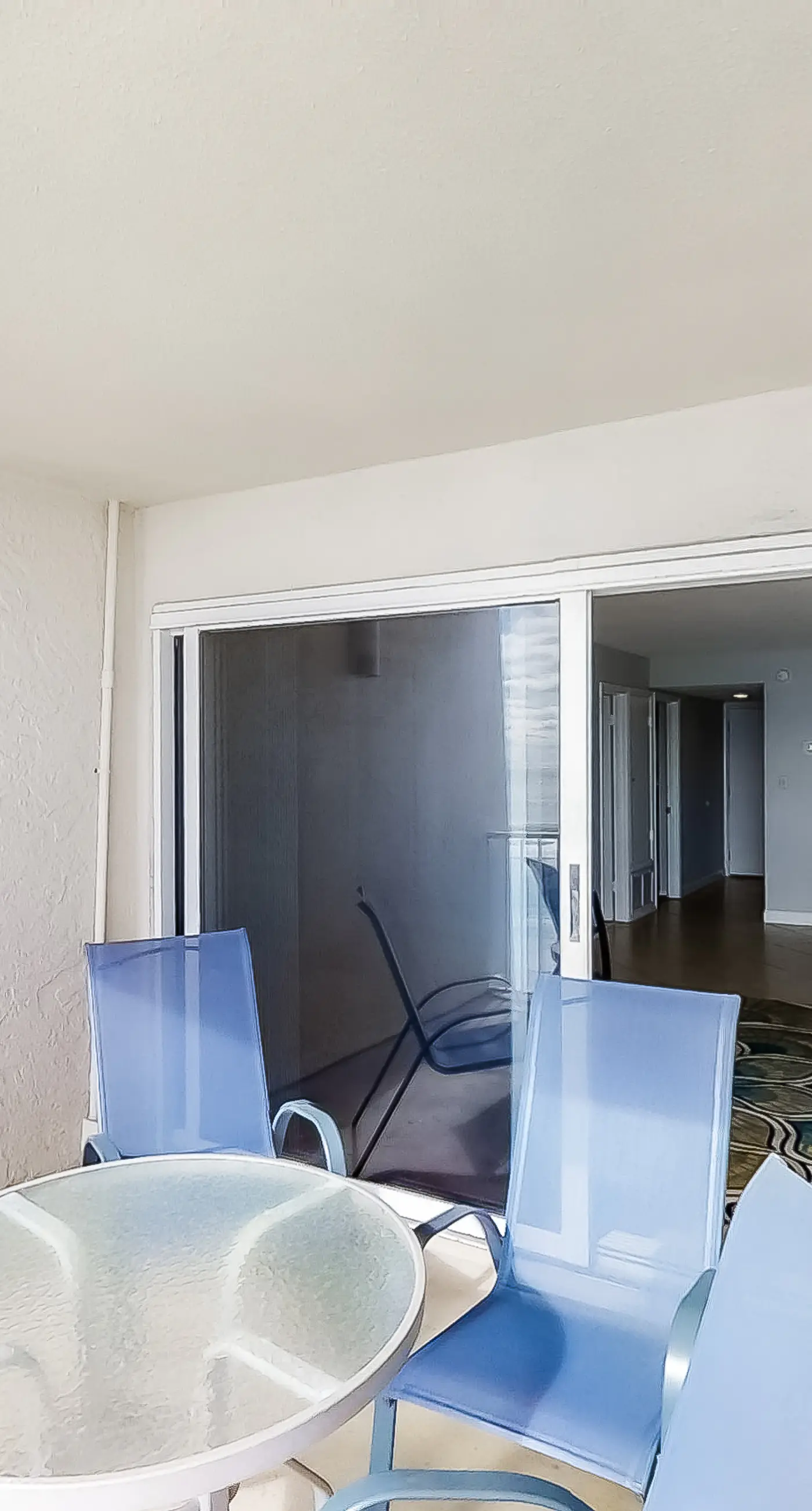 Spacious beachfront condo on second floor with balcony, beach views & pool