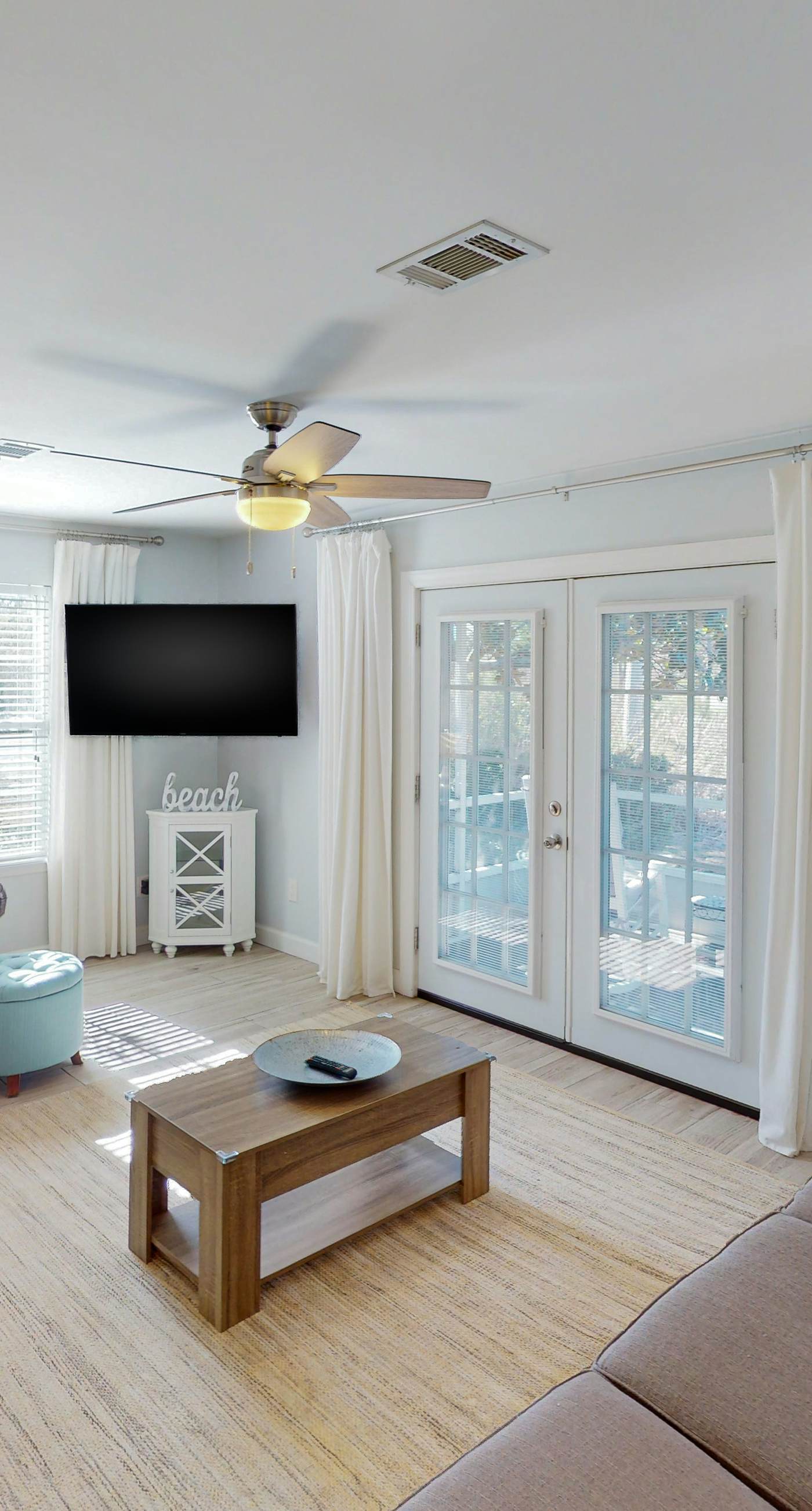 Dog-friendly townhouse near the beach with outdoor pool, water views, & AC