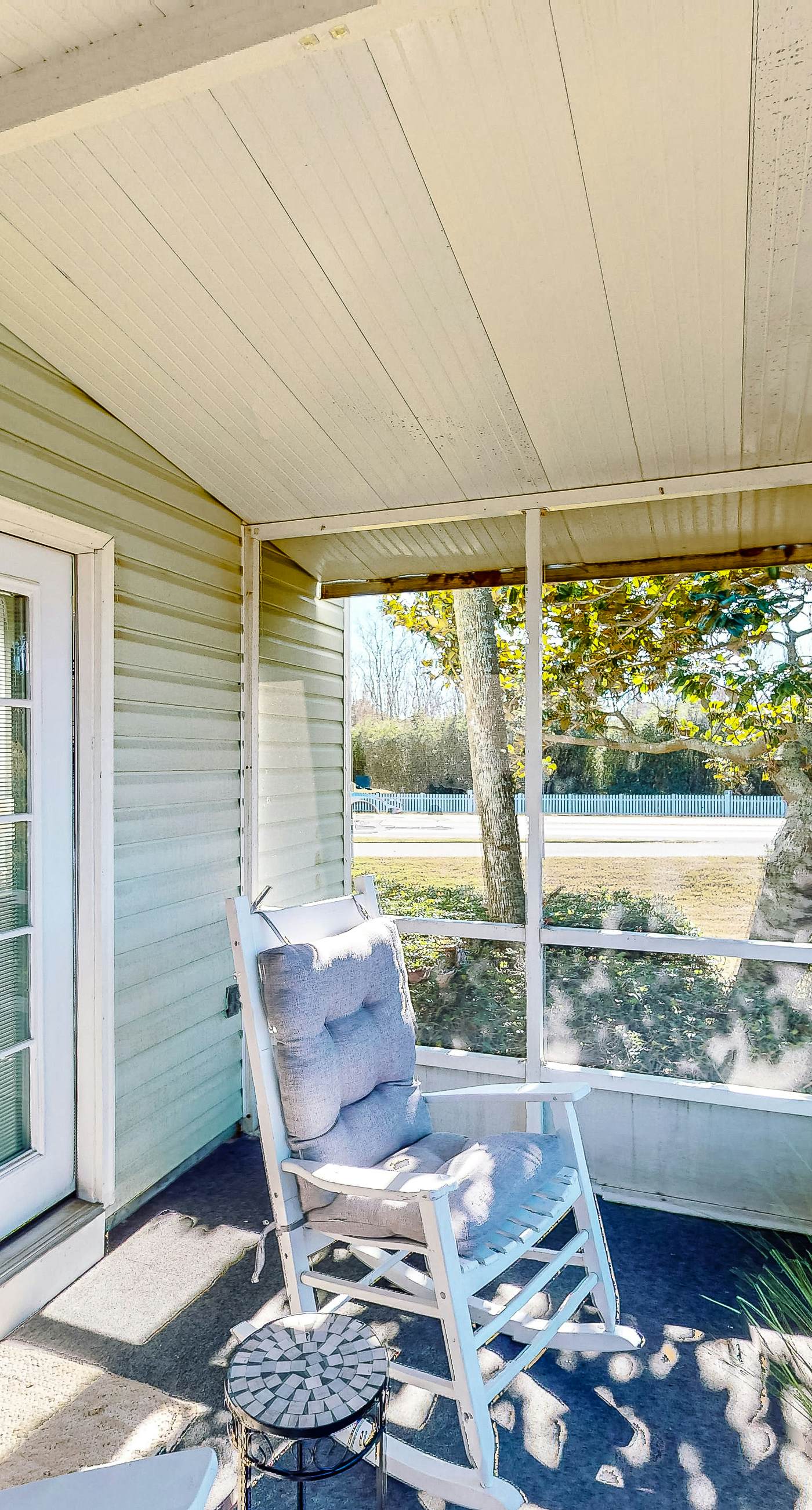 Dog-friendly townhouse near the beach with outdoor pool, water views, & AC