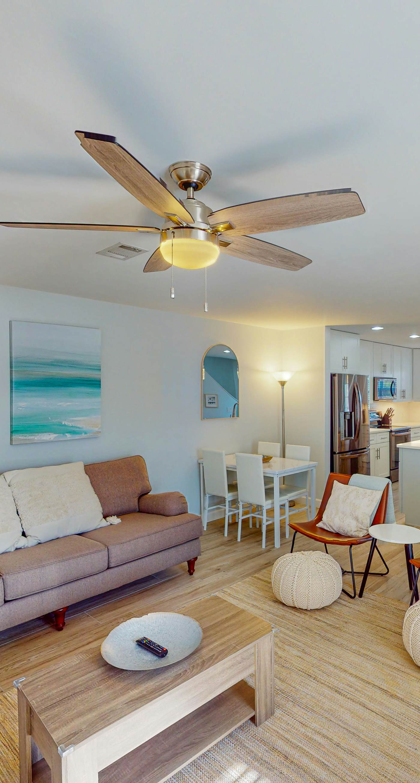 Dog-friendly townhouse near the beach with outdoor pool, water views, & AC