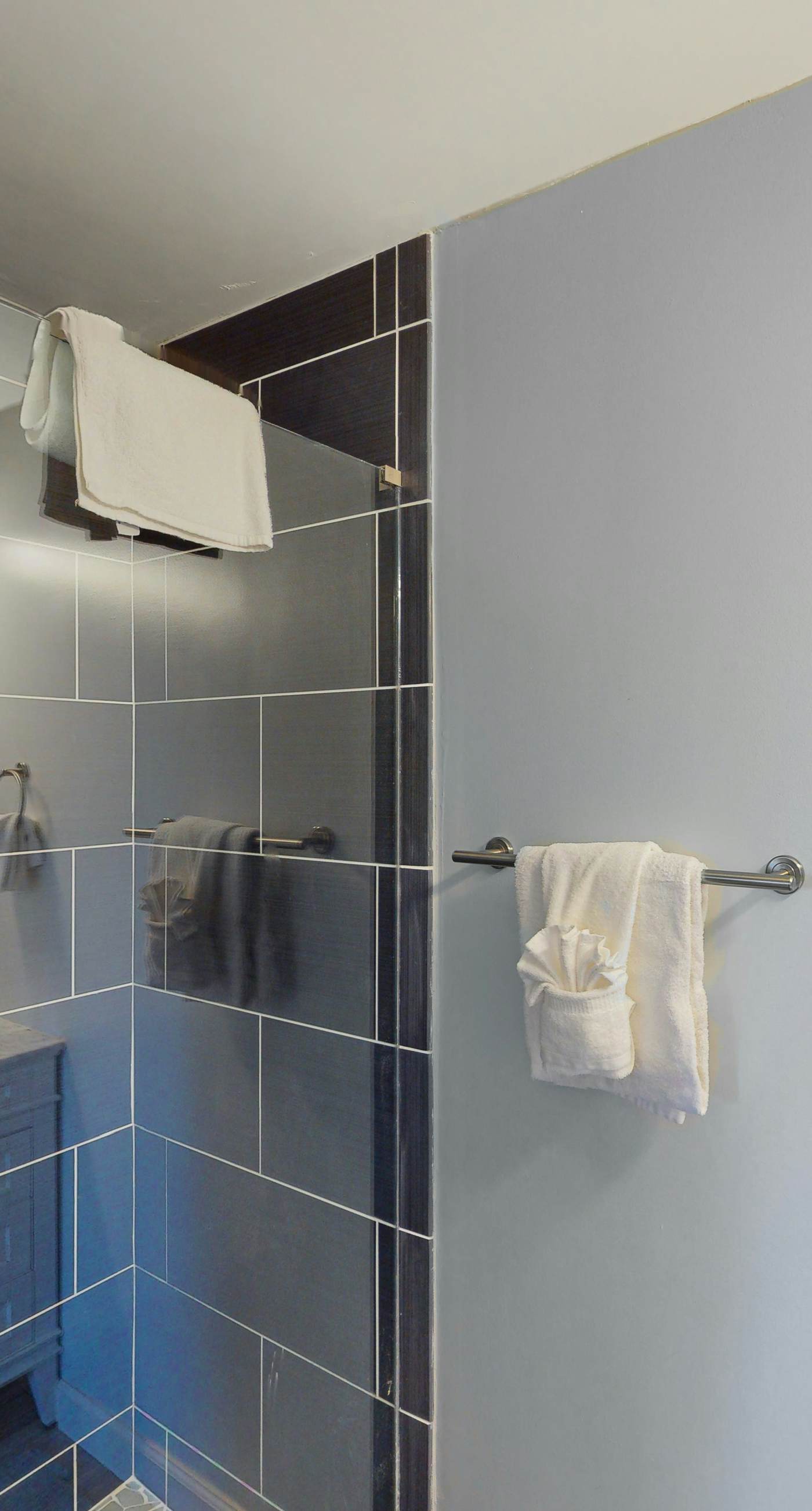 Dog-friendly townhouse near the beach with outdoor pool, water views, & AC