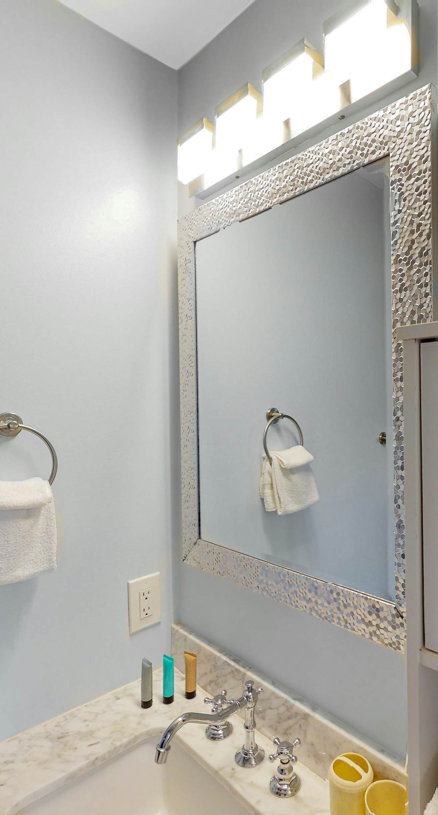 Dog-friendly townhouse near the beach with outdoor pool, water views, & AC