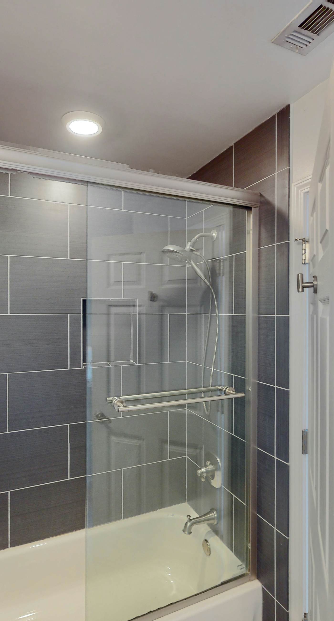 Dog-friendly townhouse near the beach with outdoor pool, water views, & AC