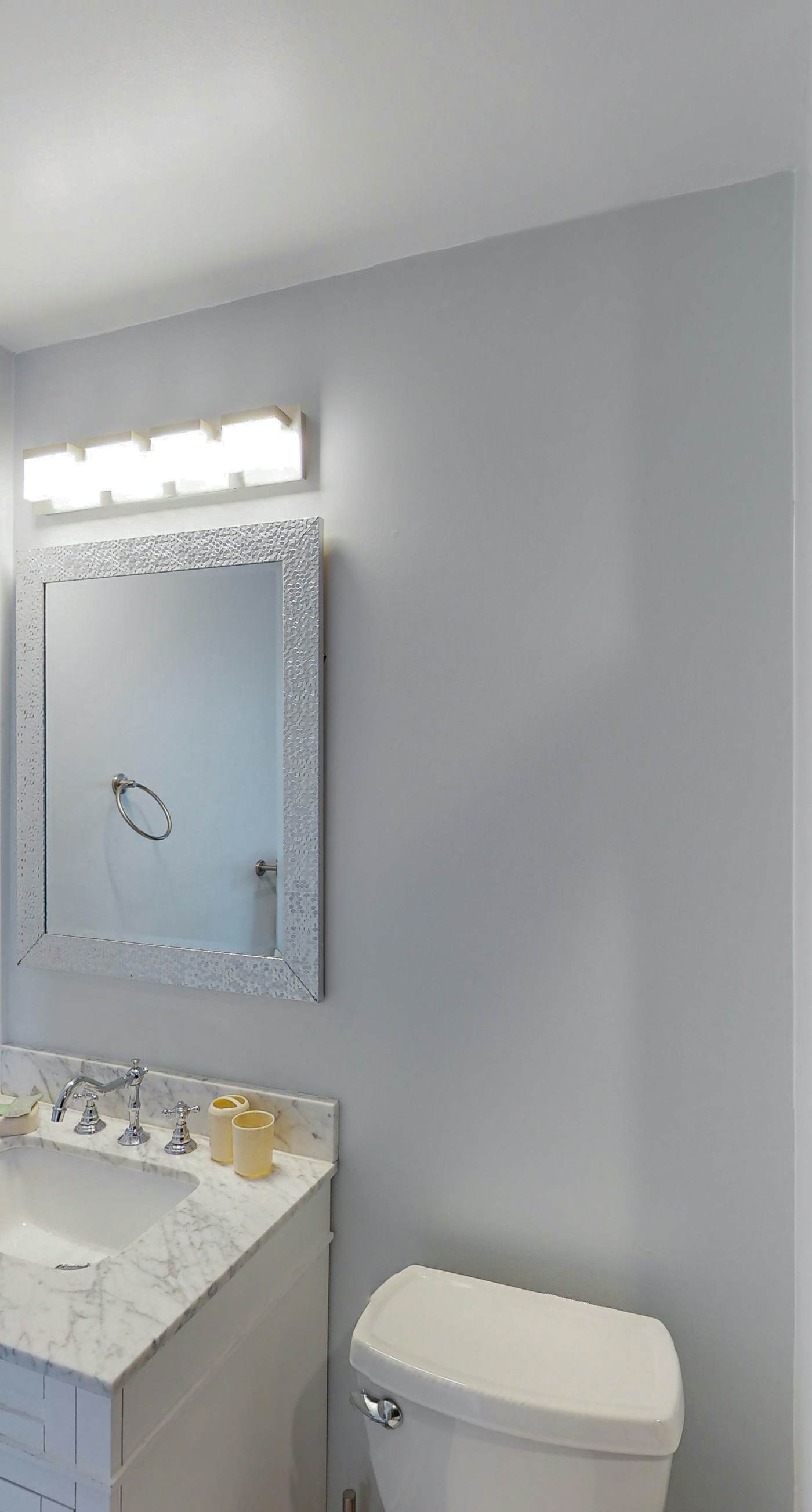 Dog-friendly townhouse near the beach with outdoor pool, water views, & AC