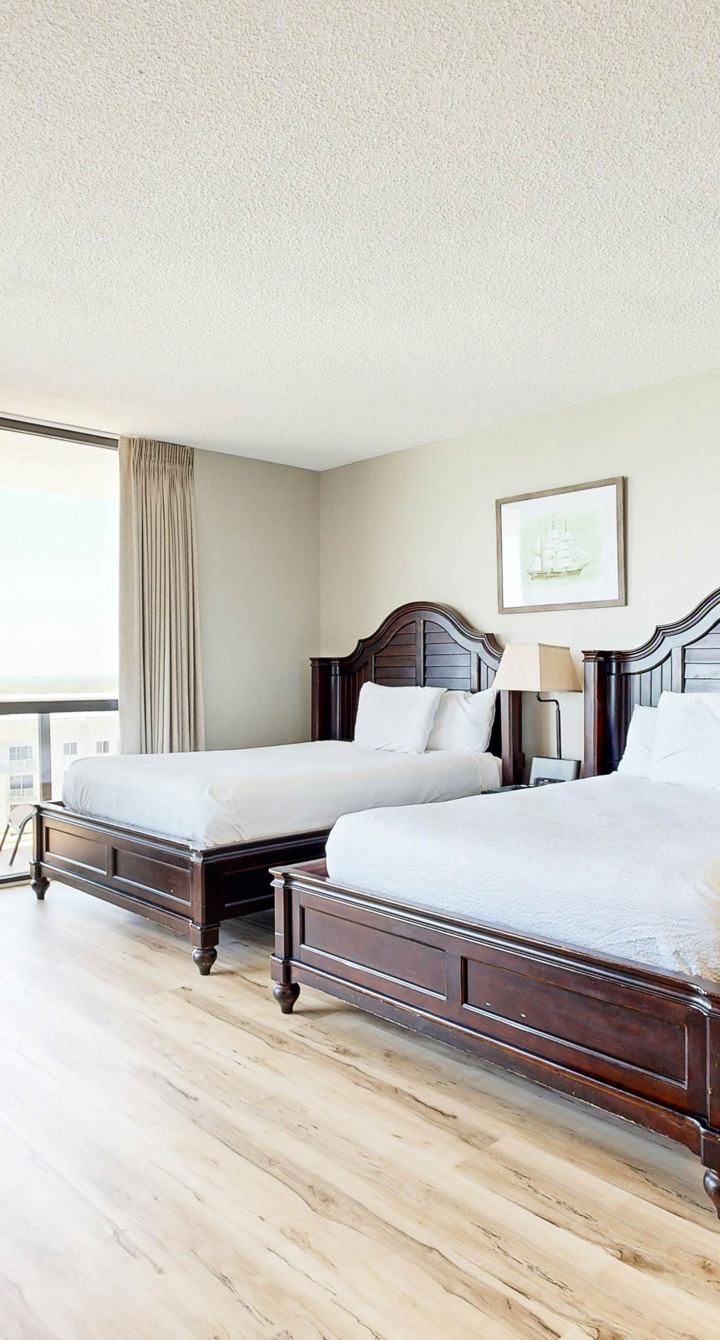 Cozy coastal condo with balcony, beach views, & resort pool