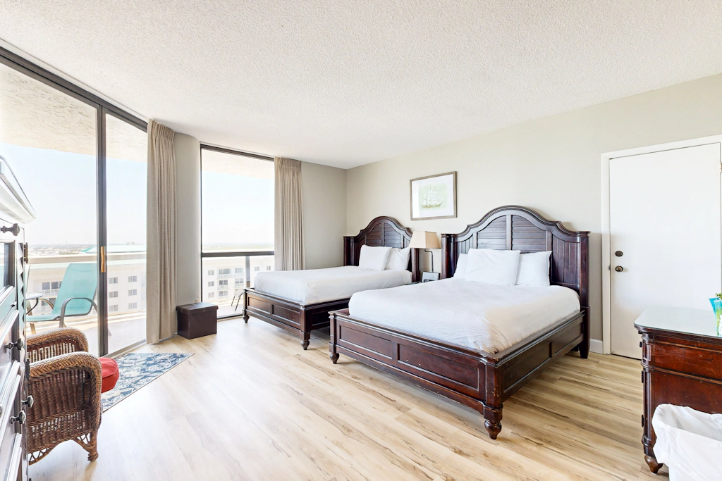 Cozy coastal condo with balcony, beach views, & resort pool