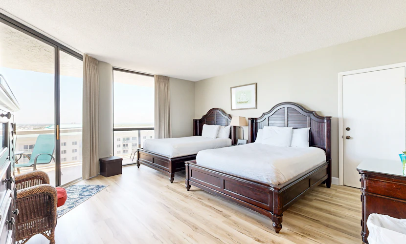 Cozy coastal condo with balcony, beach views, & resort pool