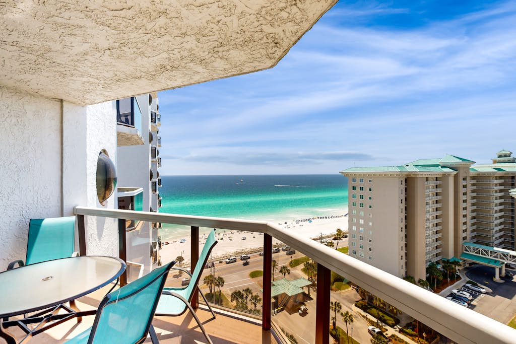 Cozy coastal condo with balcony, beach views, & resort pool