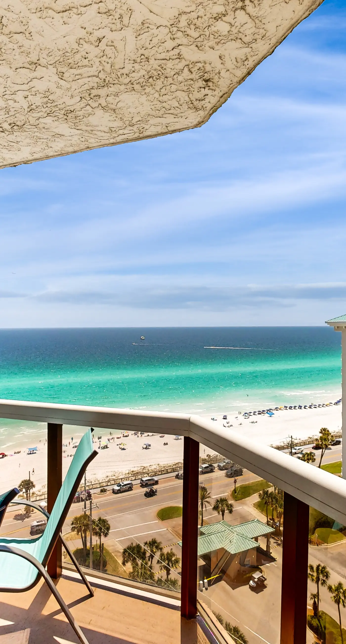 Cozy coastal condo with balcony, beach views, & resort pool