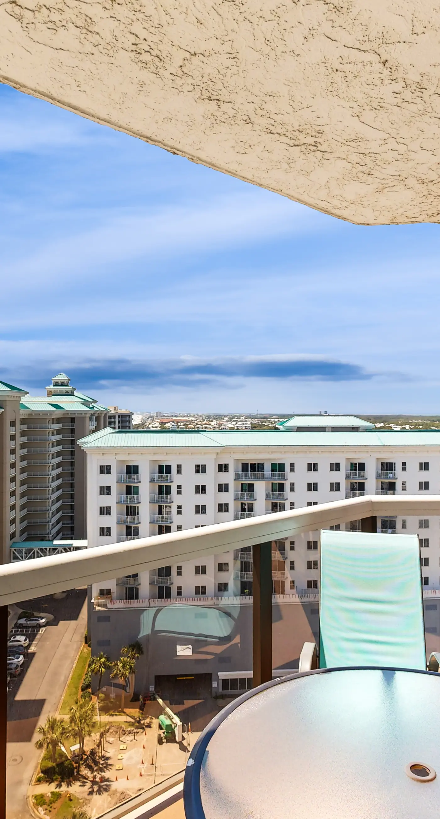 Cozy coastal condo with balcony, beach views, & resort pool