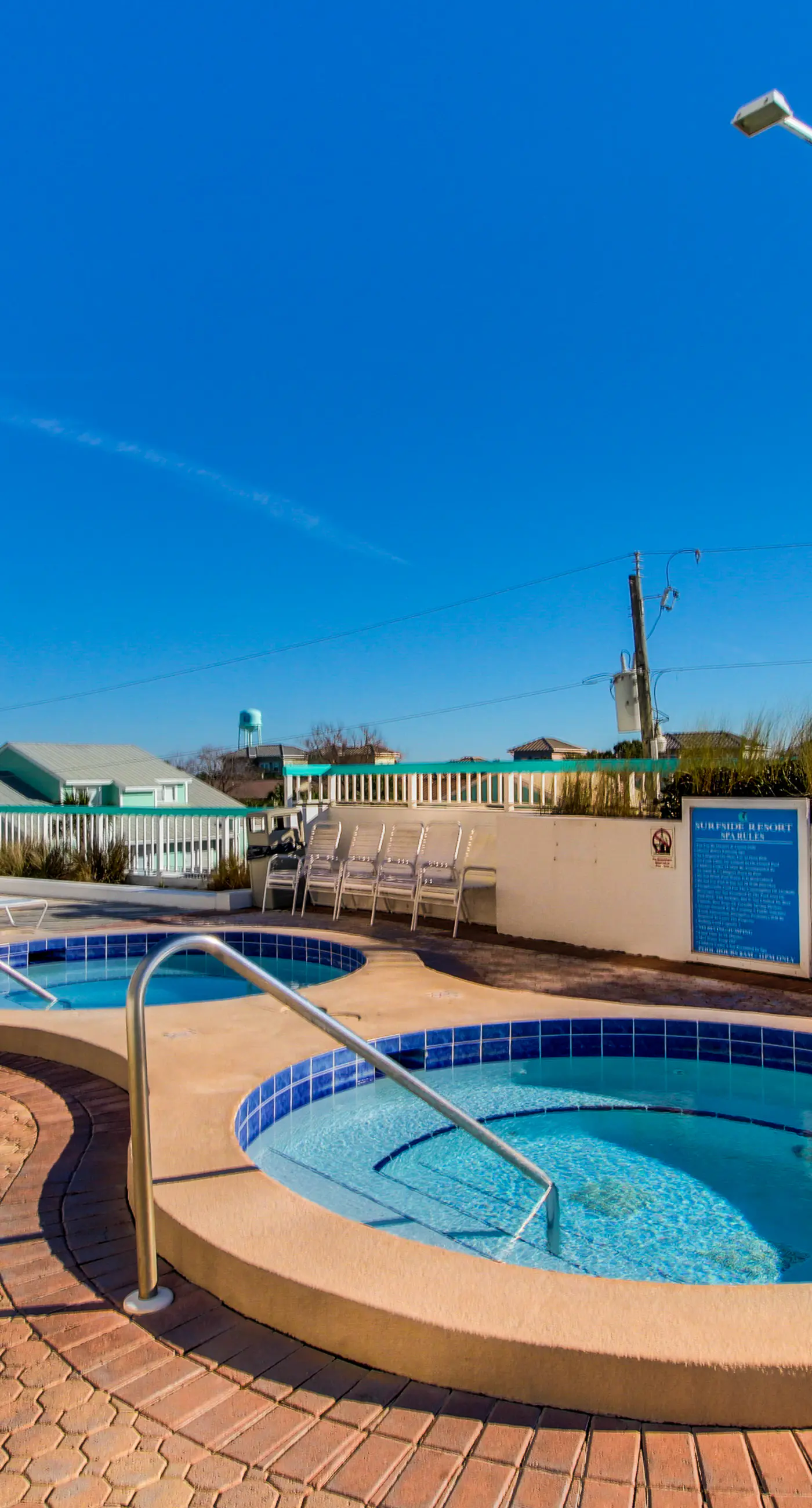 Cozy coastal condo with balcony, beach views, & resort pool