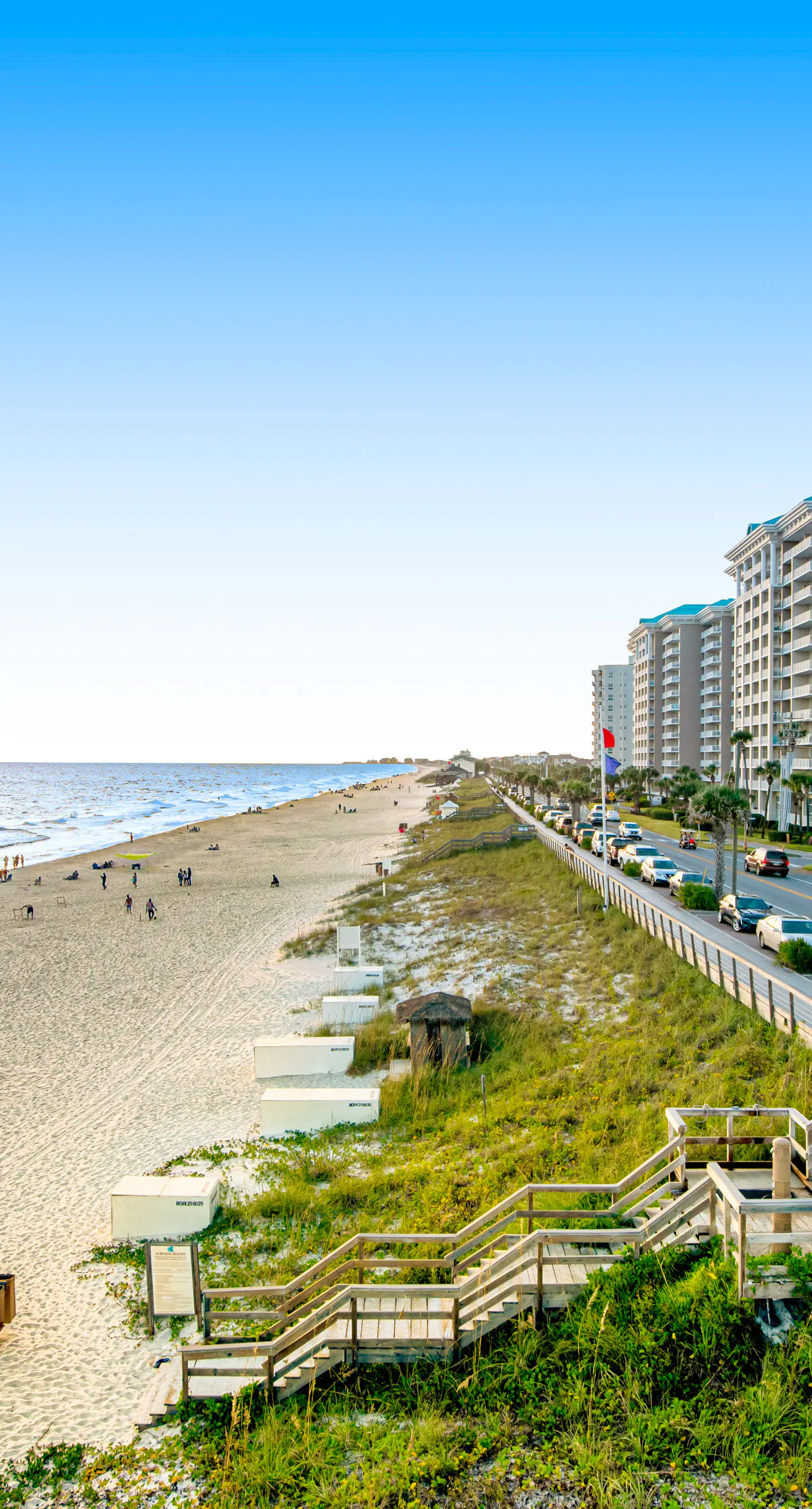 Cozy coastal condo with balcony, beach views, & resort pool